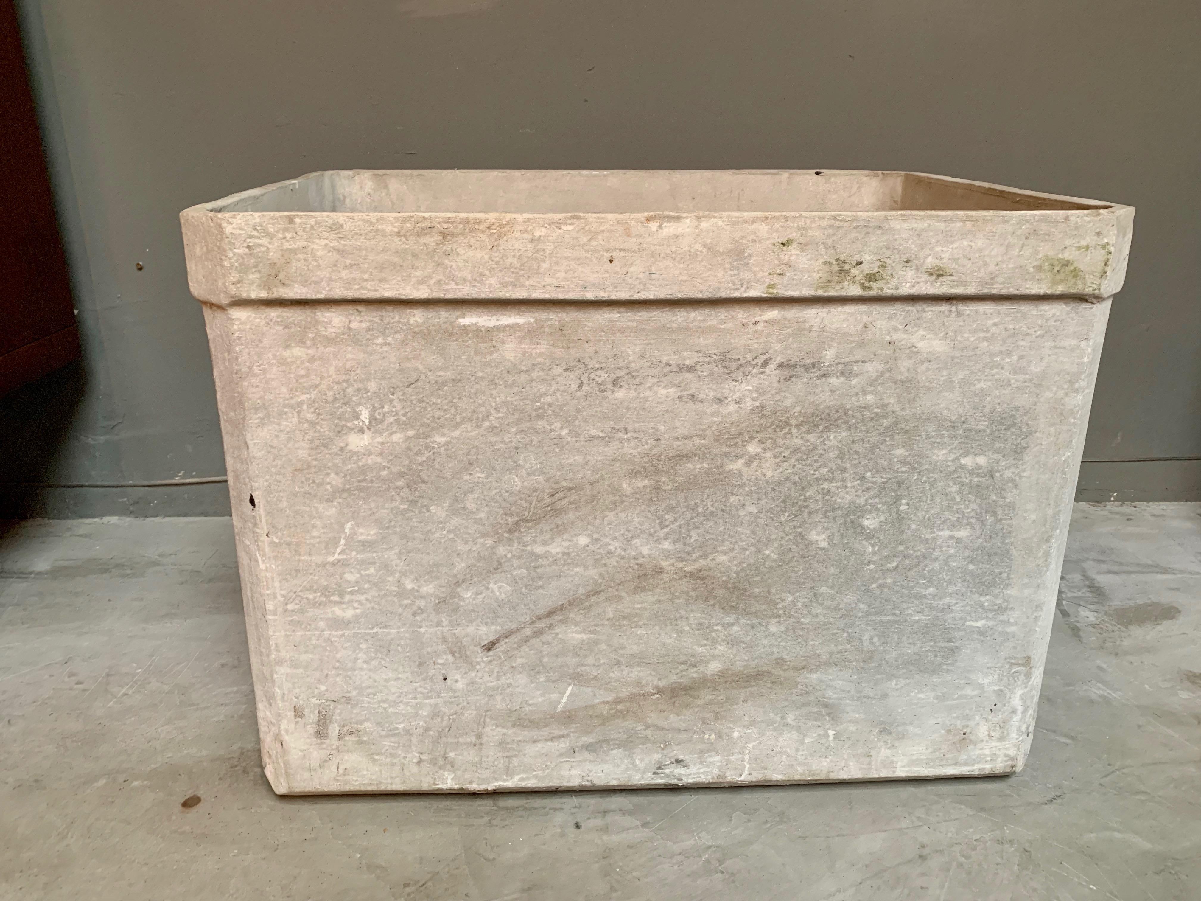 Great oversized planter by Willy Guhl for Eternit. Classic design. Fantastic original patina and in very good condition. Rectangular bin with faceted lip. Only one available. Good for small to medium sized trees. 


