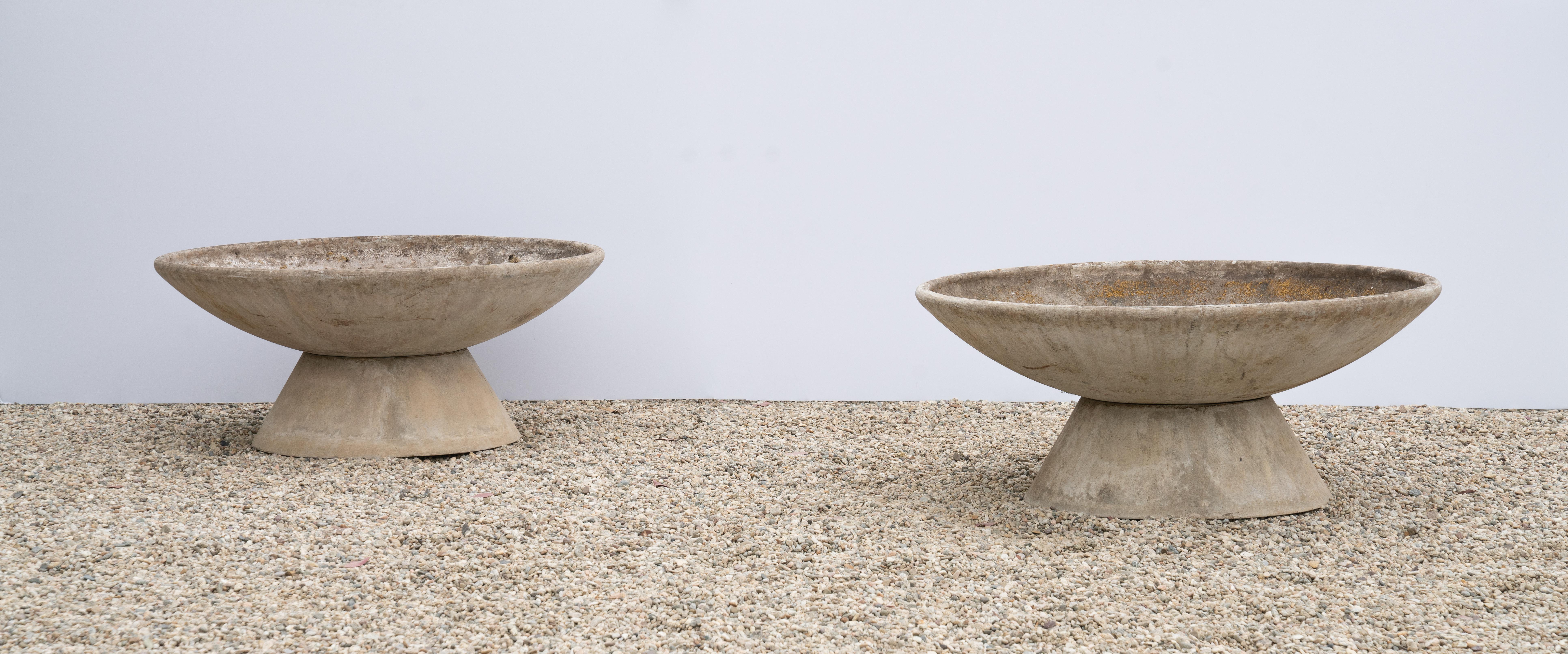 Matching pair of large concrete bowl planters by Swiss architect Willy Guhl for Eternit on stand.
Wonderful patina and character.
Pair available - Priced individually.