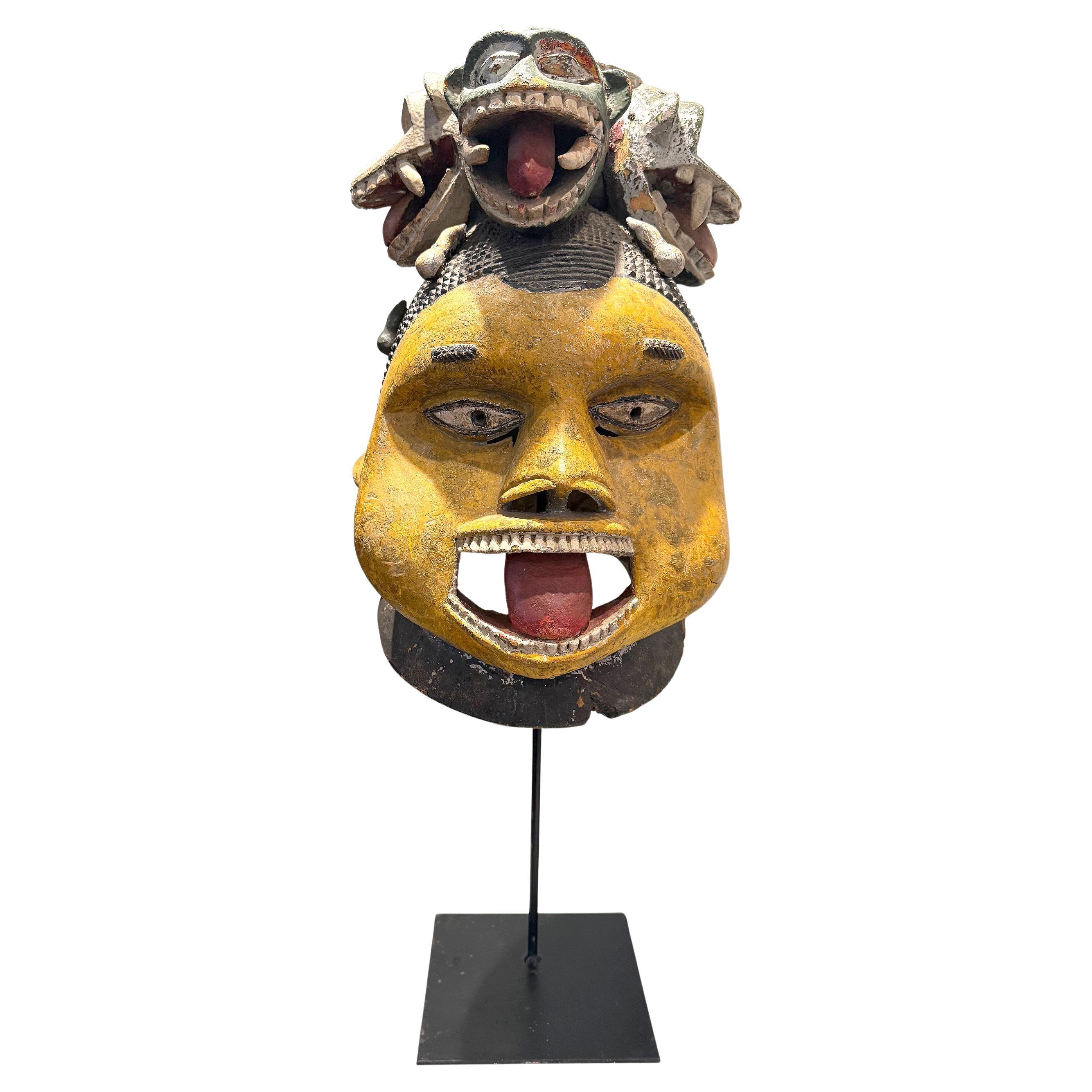 Large Wood Sculpture Yoruba Gẹ̀lẹ̀dẹ́ Helmet Mask on Display Stand For Sale