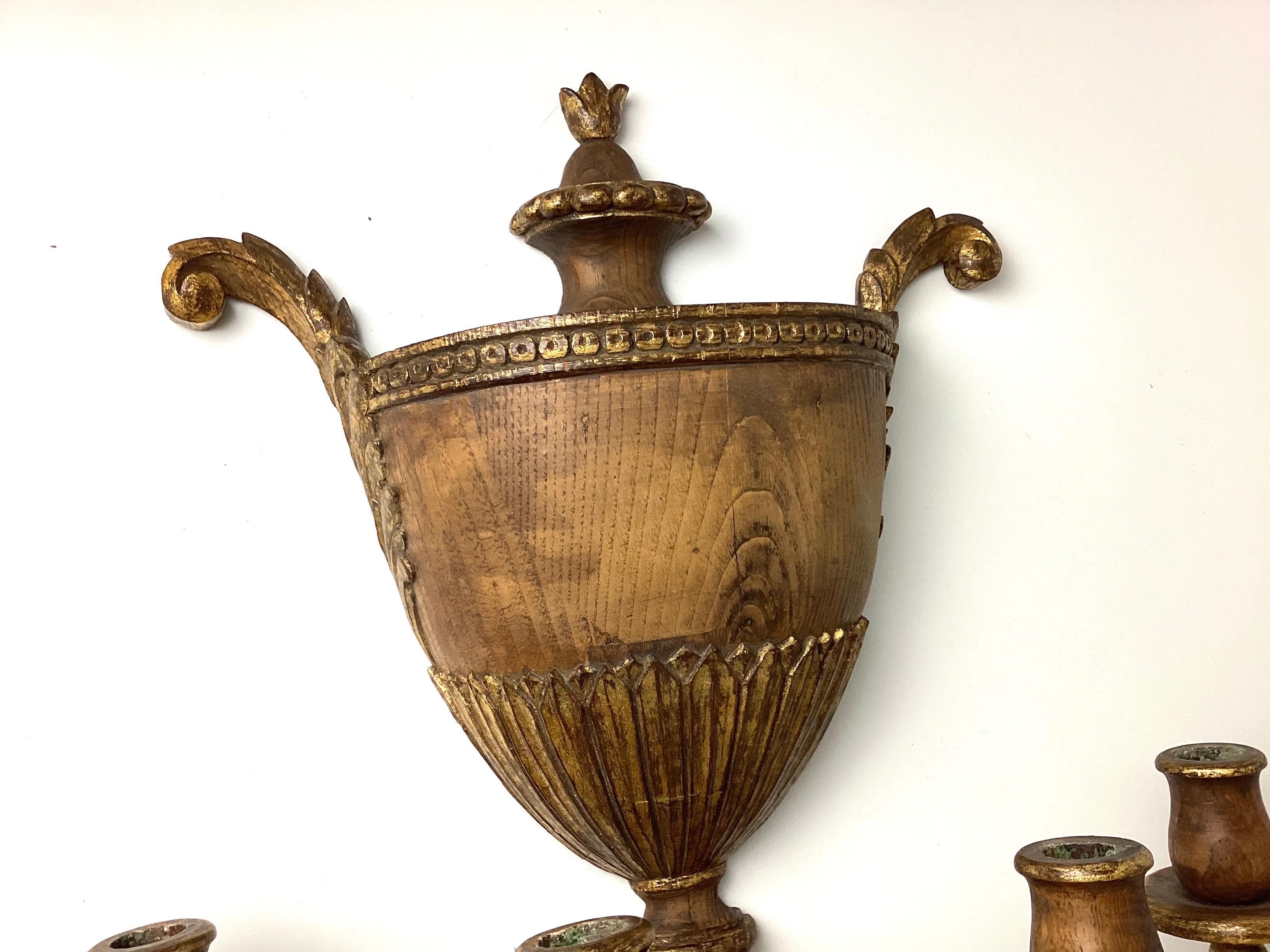Large wood with gold gilt four light urn form wall sconce. Marked Made In Spain on back. It has wires running to the cups but no sockets. Remnant's of wax in cups. 24
