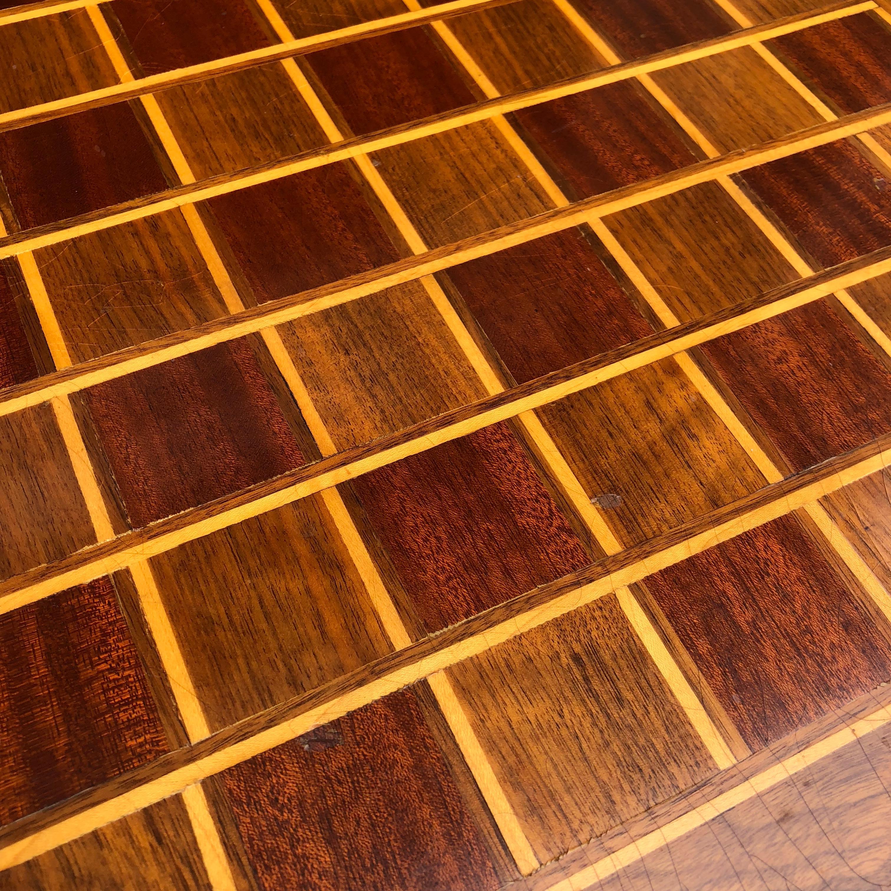 Wooden Folk Art game board for chess or checkers.
The large board is hand crafted with inlay surrounding each individual square. The frame of the board has a slight bevel adding to the game board's beauty. The back of the game board is fully