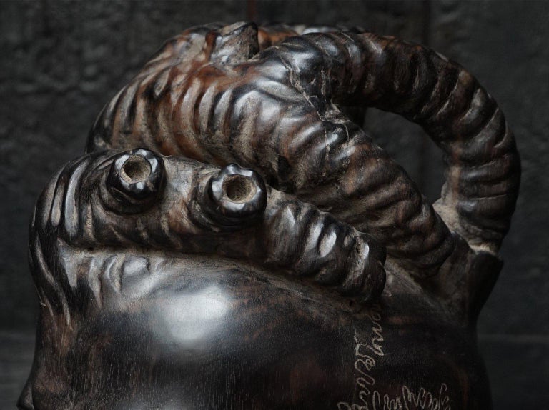 Large Wooden HandCarved Ebony Heart Skull and Small Demon Skull at 1stDibs