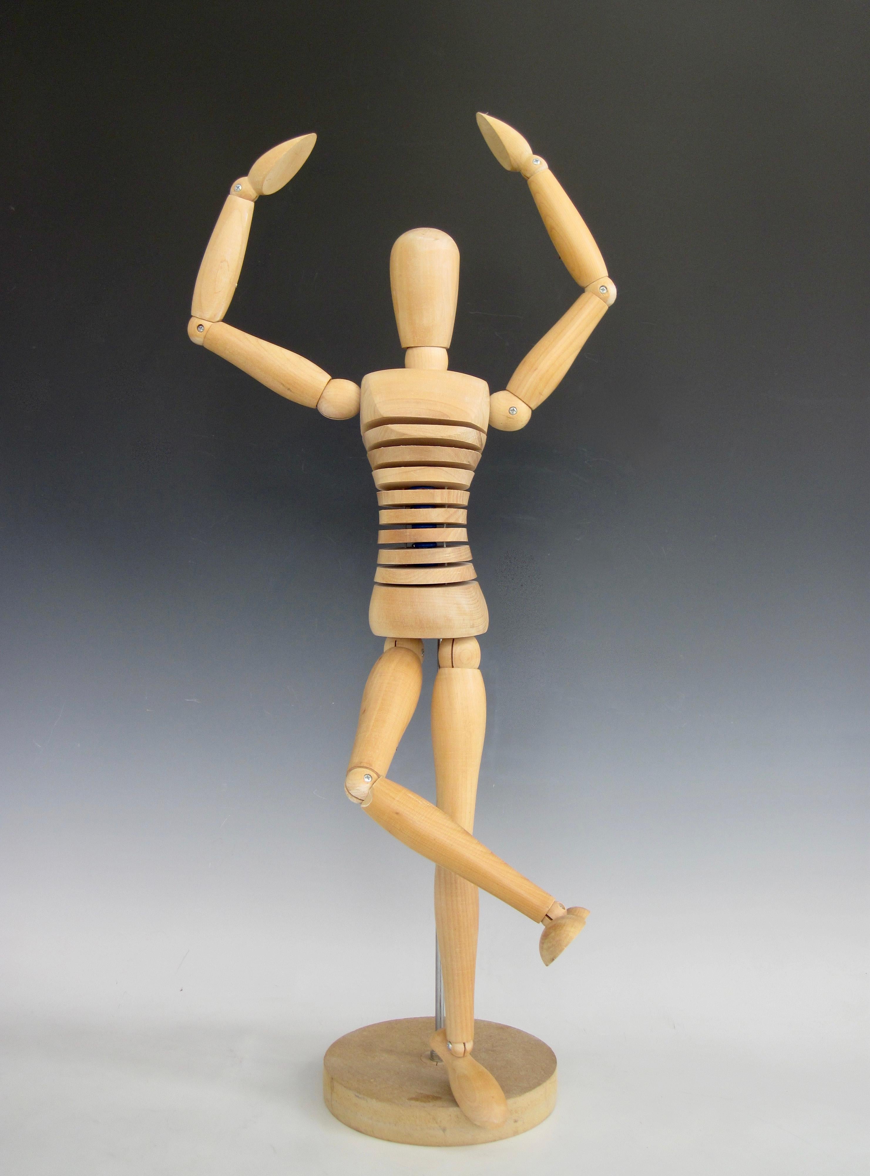 wooden person figure