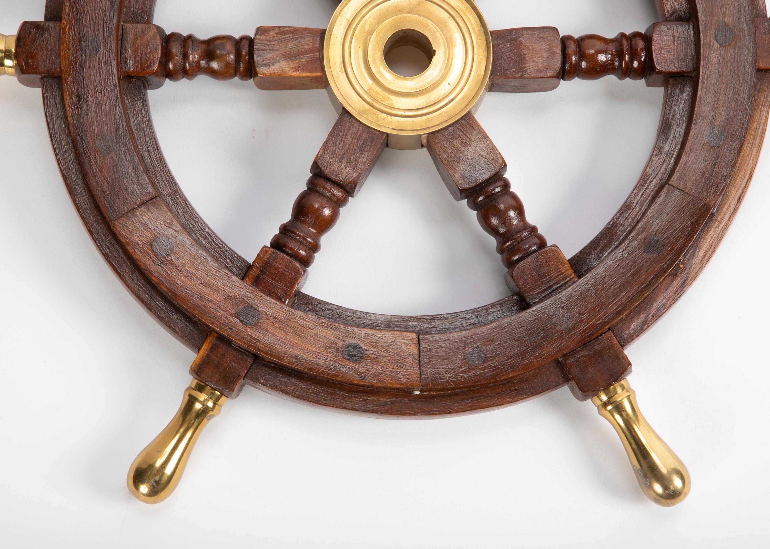 Hand-Crafted Large Wooden Ship's Wheel with Brass Accents For Sale