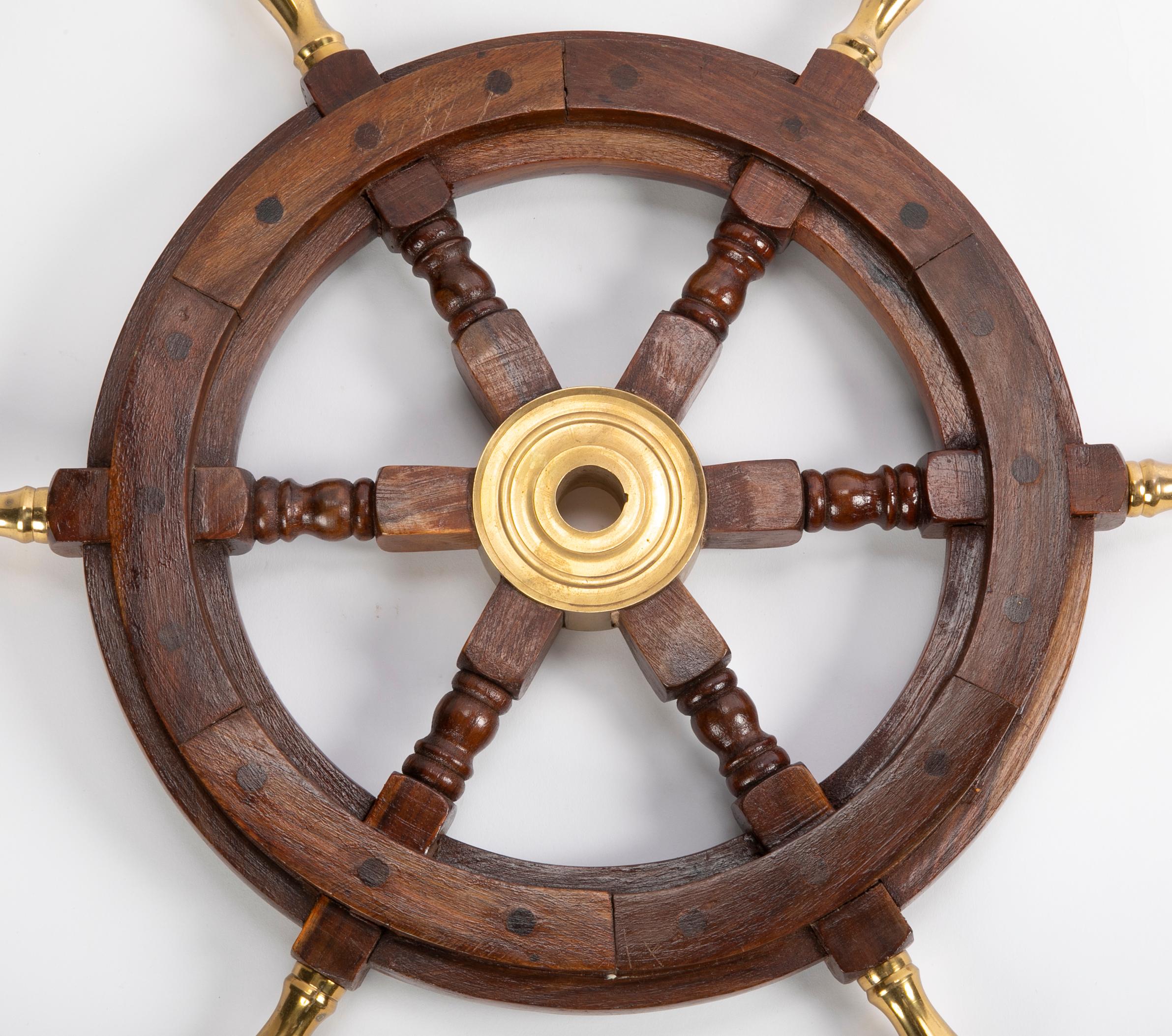 Large Wooden Ship's Wheel with Brass Accents In Fair Condition For Sale In New York City, NY