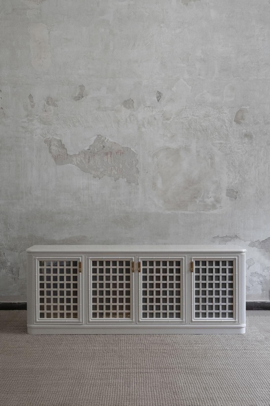 Large Wooden Sideboard - Lacquered Series 
Product details
With antiqued mirror doors, internal shelves, and brass pulls.
Dimensions: 201 W x 76 H x 47 D cm