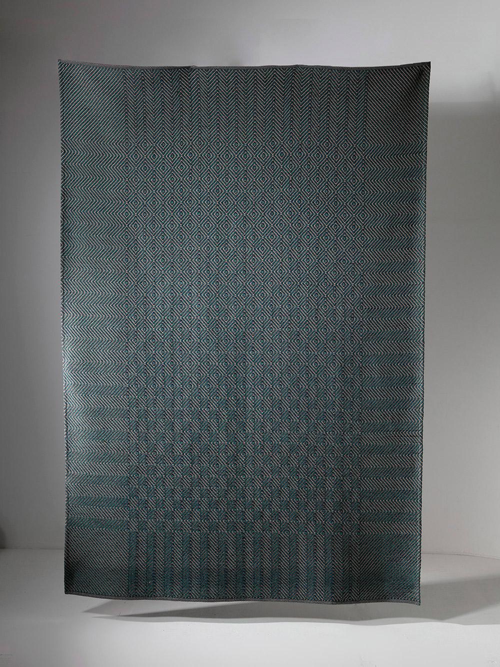 Large wool tapestry by Renata Bonfanti.
Remarkable combination of shapes and color shades