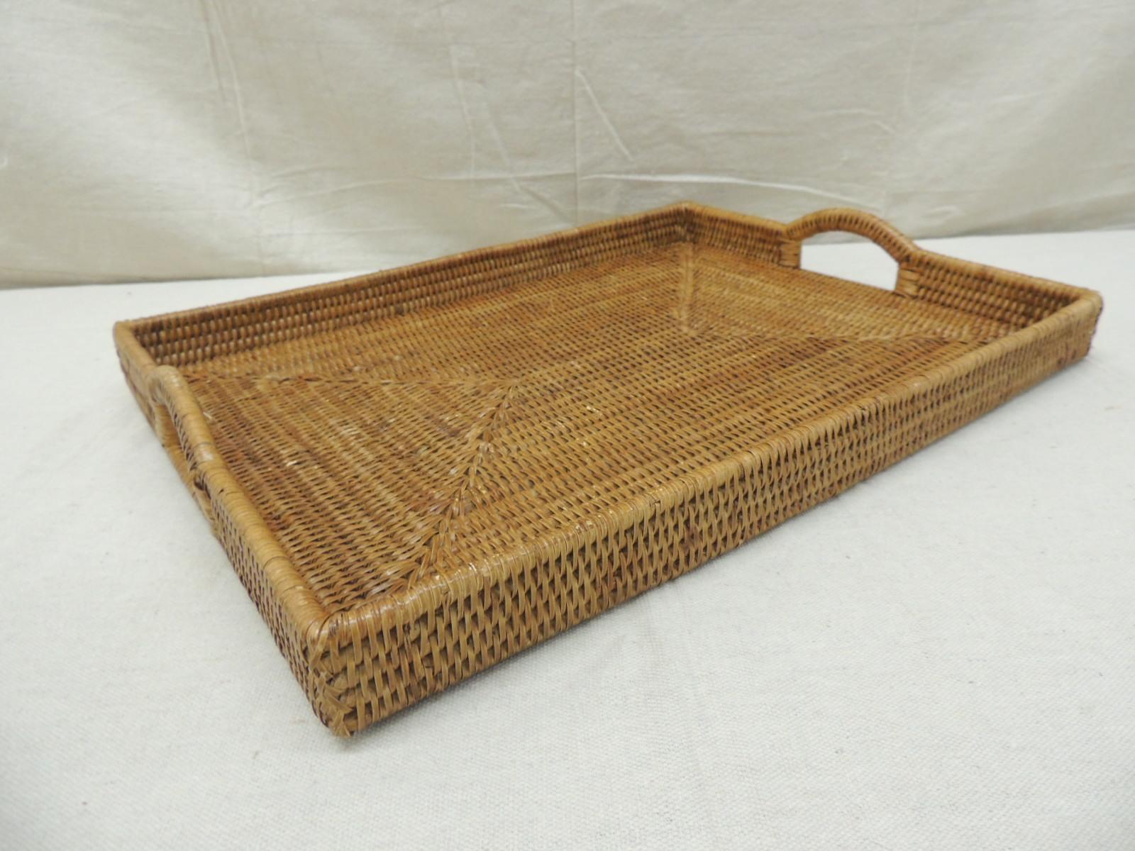 Large woven rattan serving tray with handles
Measures: 19” W x 14.5” D x 2.5” H.
  