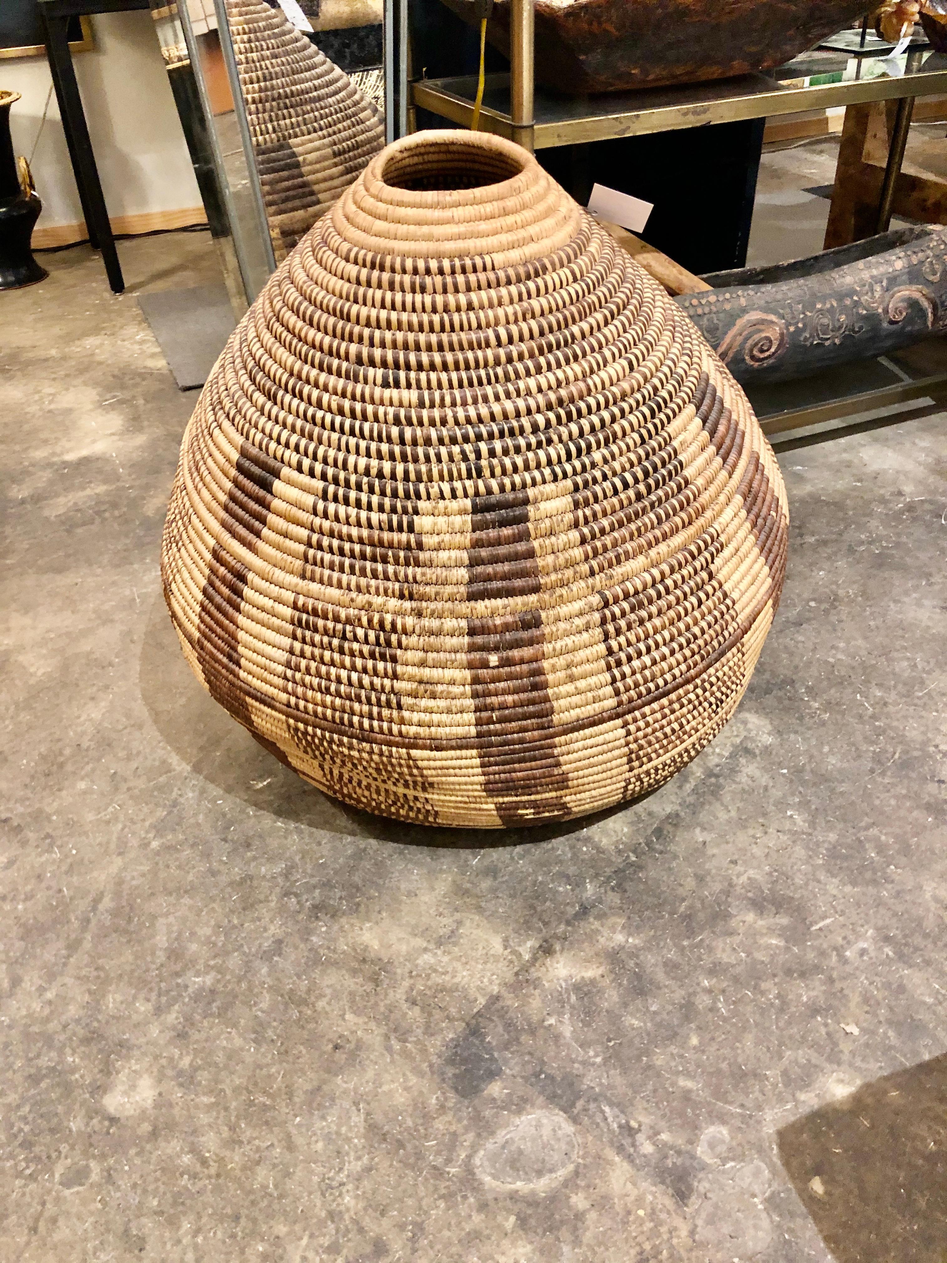 A vintage large finely woven tribal basket.