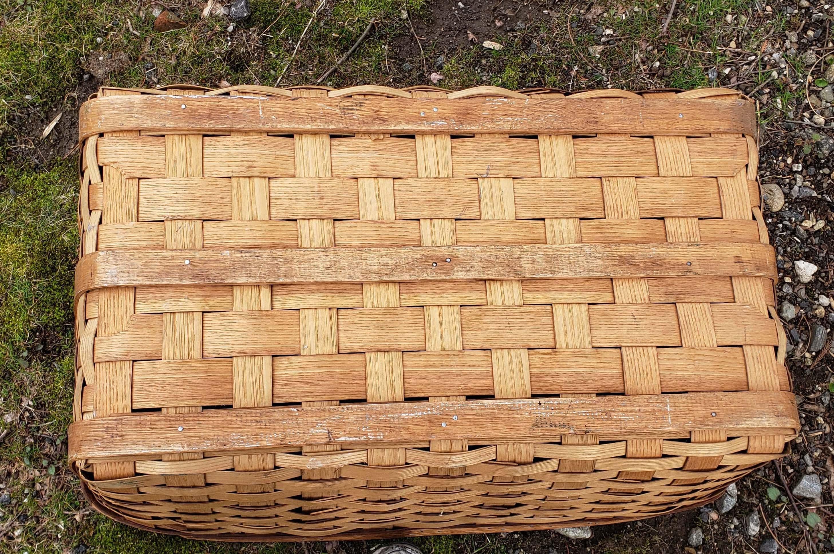 Large woven wood slat basket with cloth handles,
First part of 20th century

A great basket for clothes. We use one like it for our firewood by the fireside.

Dimensions: 12 inches x 34 inches wide x 22 inches.

 