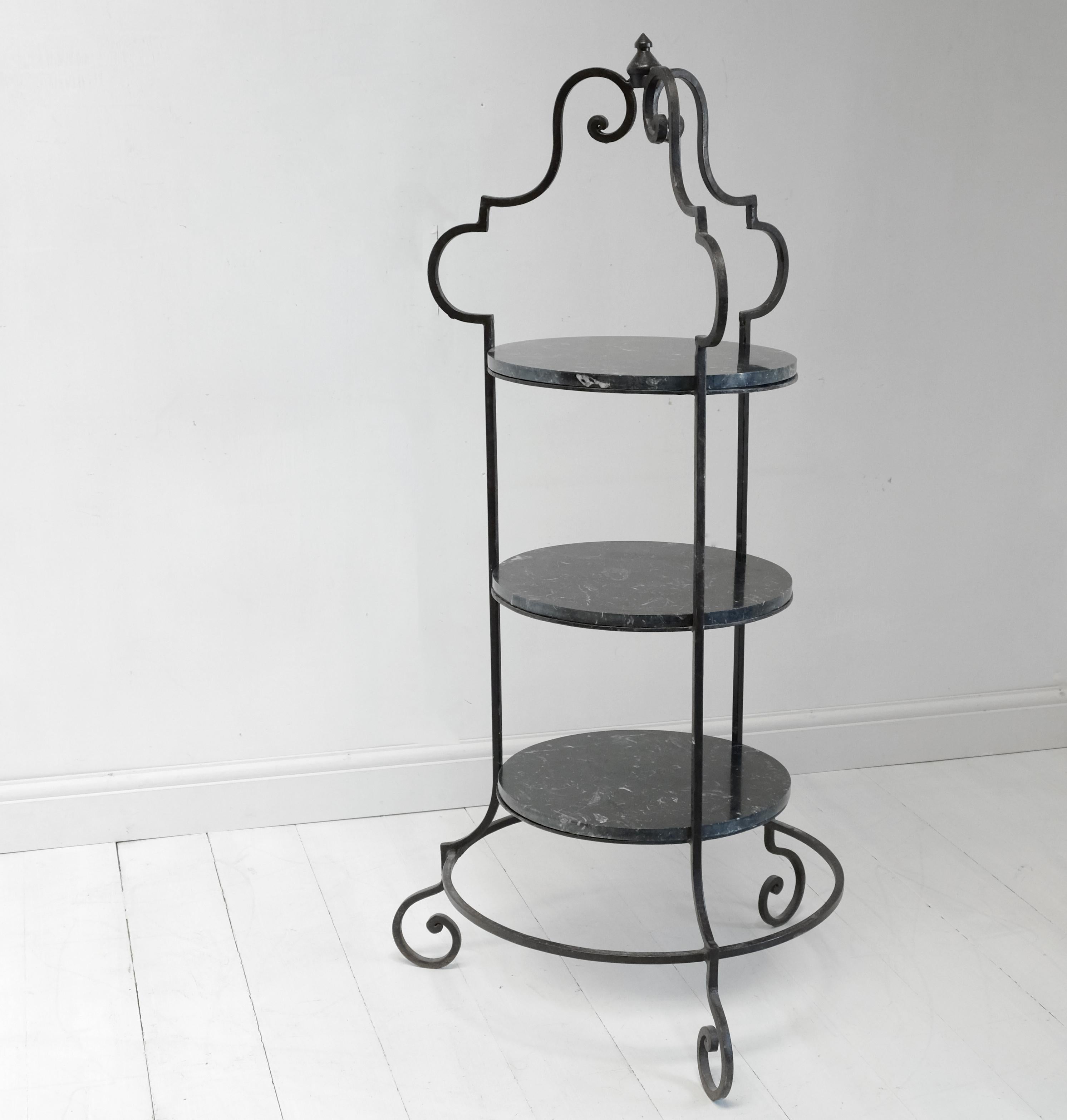 A large and incredibly stylish pâtisserie stand, handmade in wrought iron and finished with Nero Marquina marble. No great age, likely late 20th century but its sheer quality and style are second to none. We’ve only seen a couple like this in a