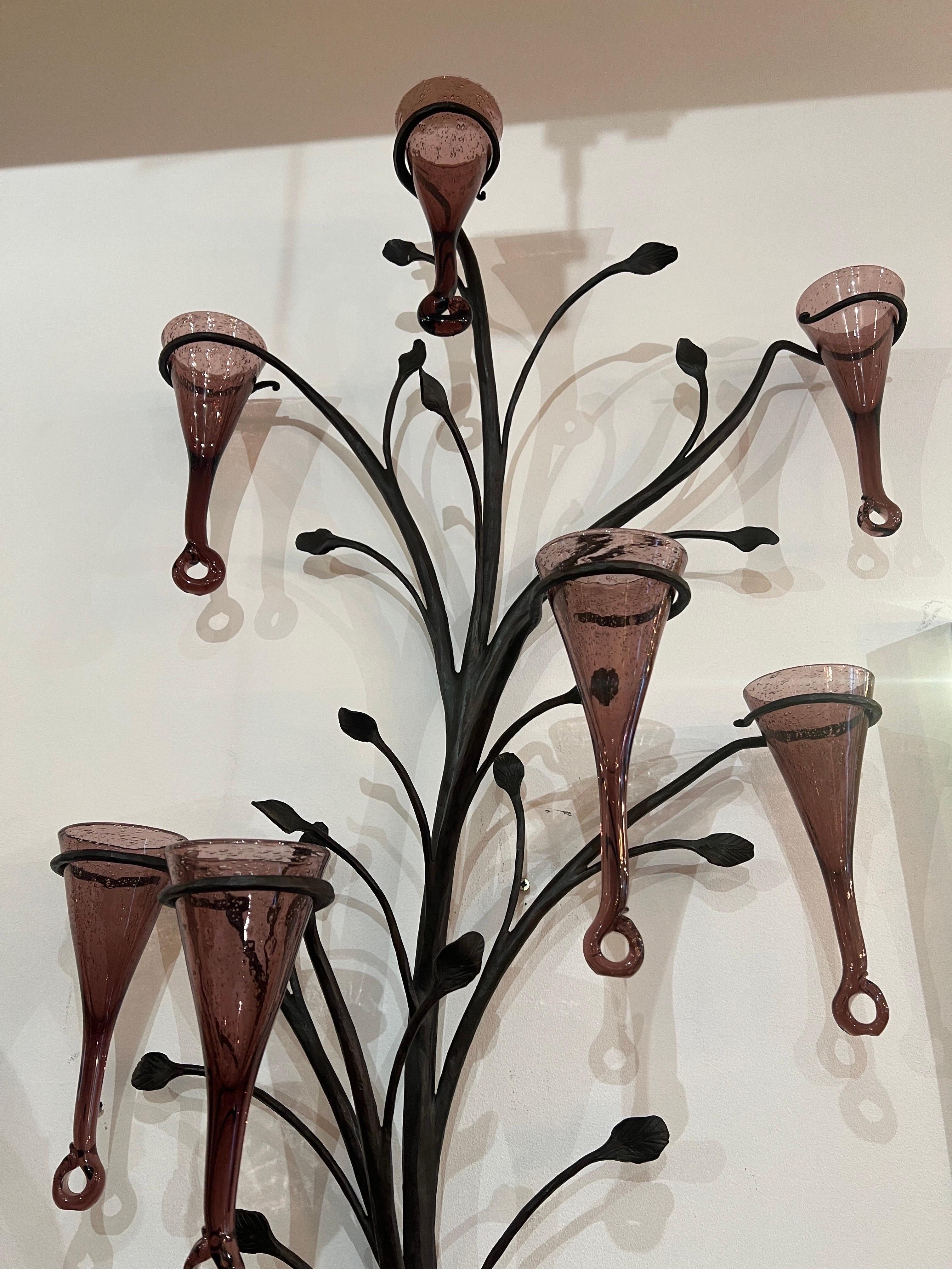 A tall and beautifully crafted wrought iron tree sculpture with 15 hand blown Murano glass vases intended to be filled with flowers so to give a feeling of a fully blossomed tree . A perfect feature against any wall in the house . The sculpture is