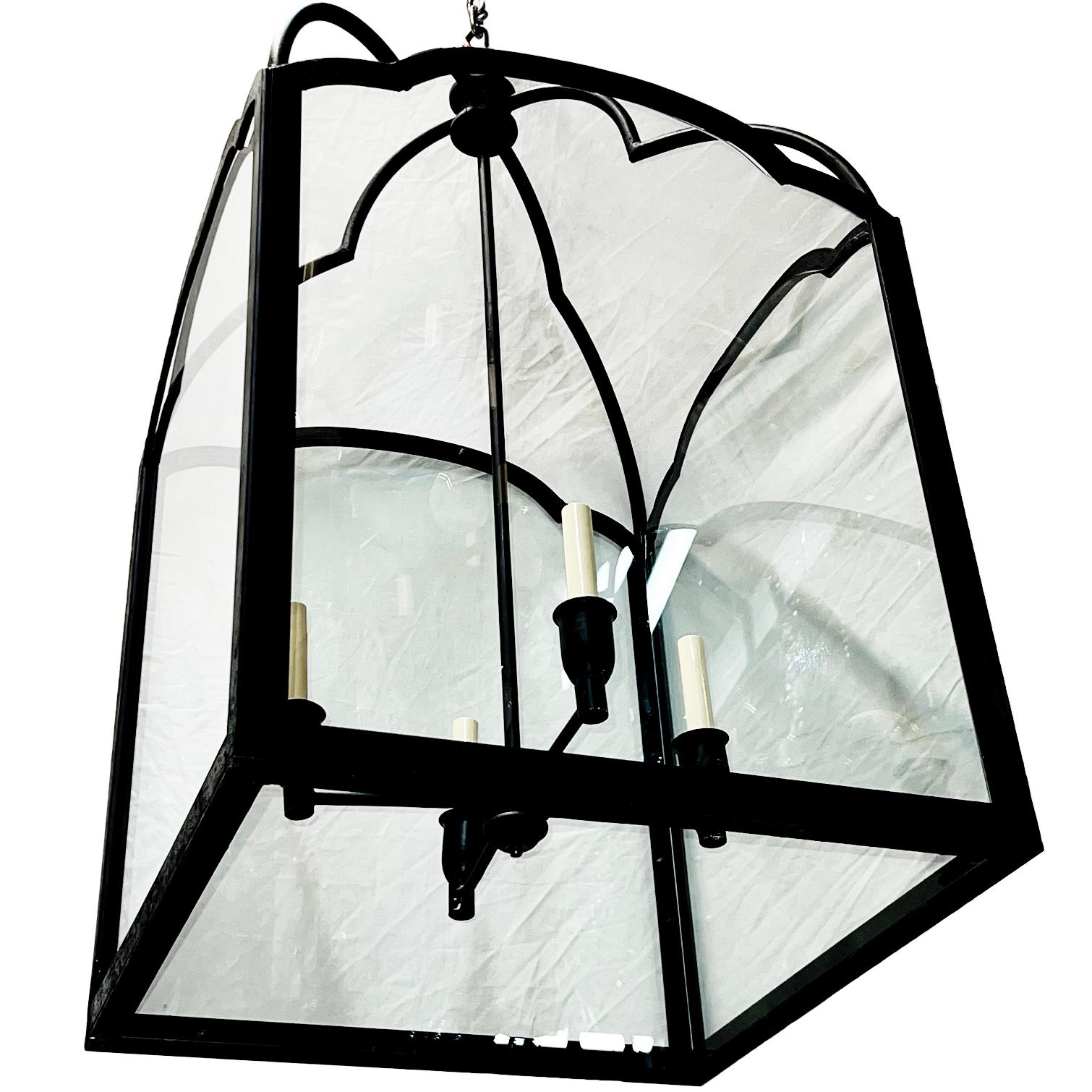 A circa 1950's French wrought iron lantern with original patina and 4 candelabra interior lights.

Measurements:
Drop: 29