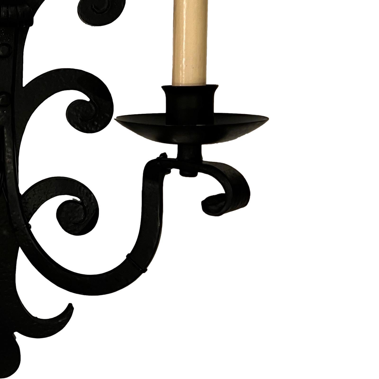 Pair of French circa 1900 large wrought iron two-arm sconces.

Measurements:
Height: 19.5