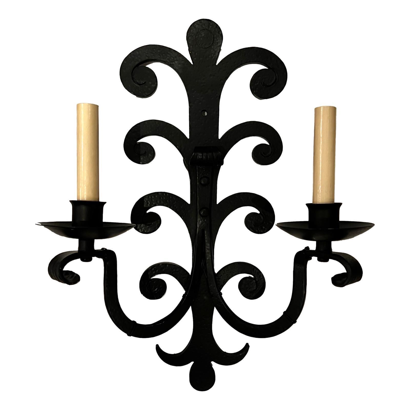large wrought iron wall sconces