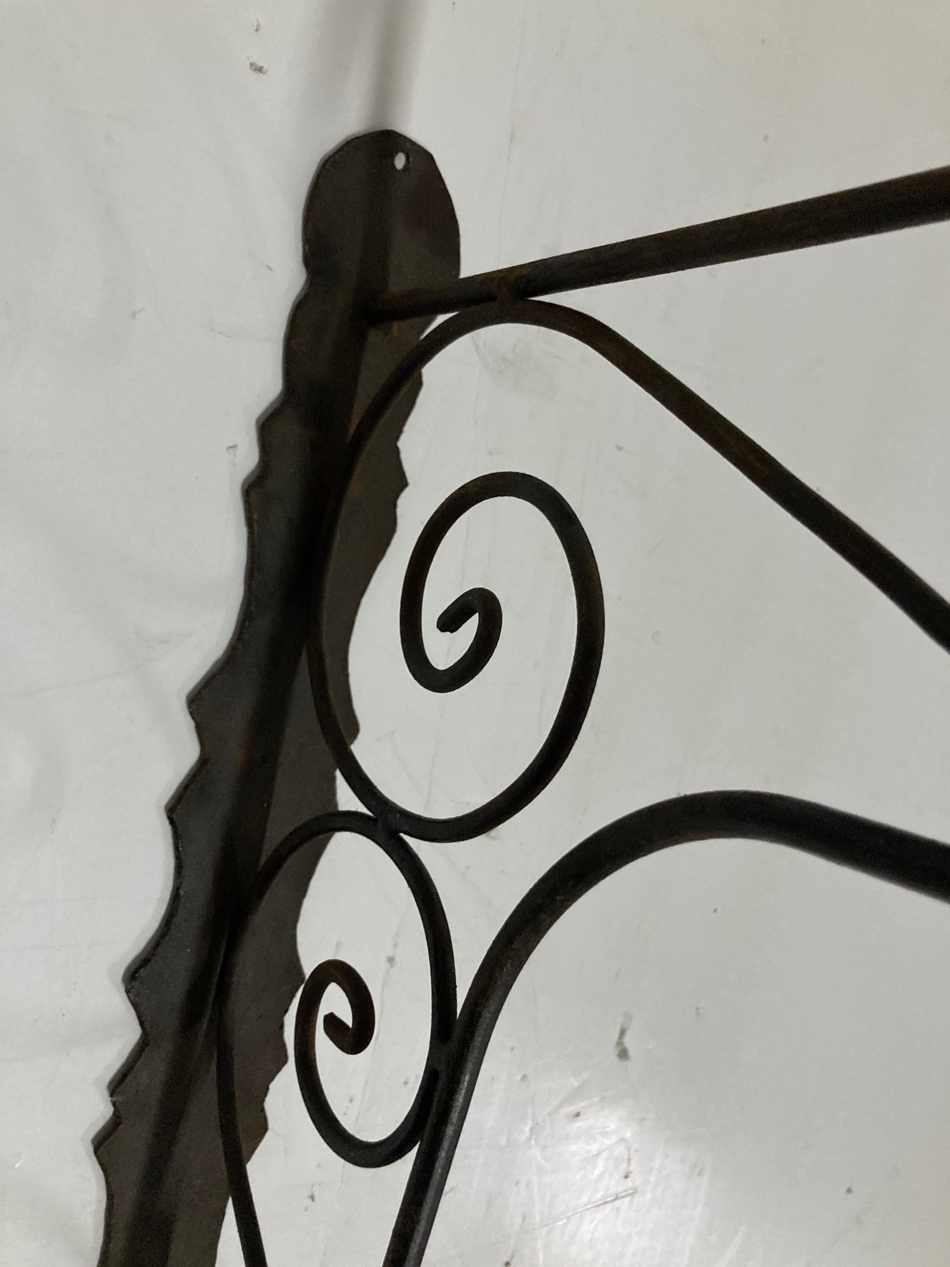 large wrought iron brackets