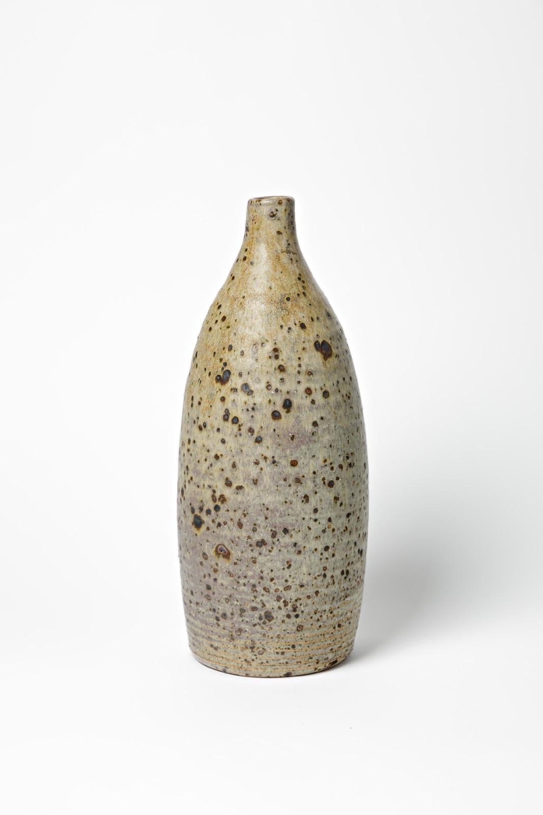 La Borne - Circa 1960

Large grey stoneware ceramic bottle or vase

Unique handmade piece

Original perfect condition

Measures: Height 36 cm
Large 14 cm.
