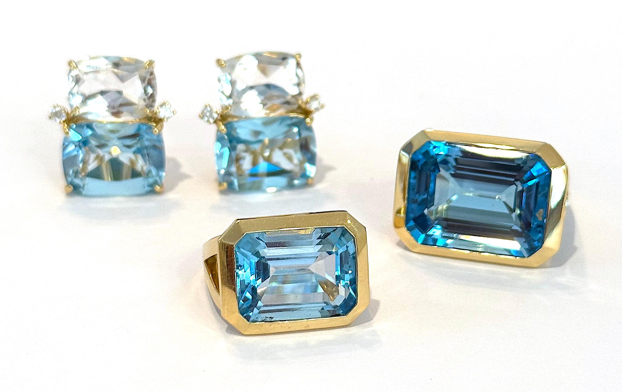 Contemporain Large bague en or jaune avec topaze bleue taillée en émeraude en vente