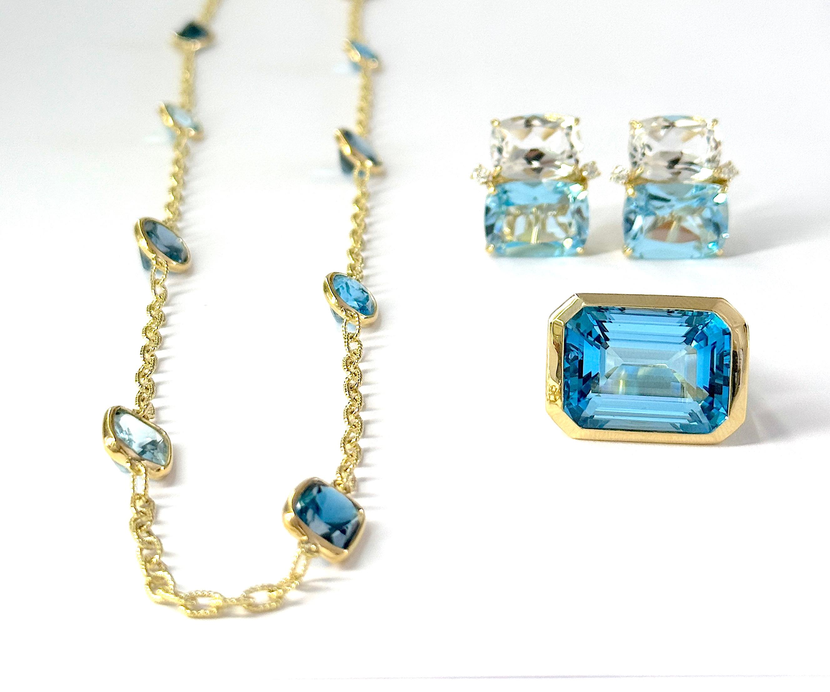Large bague en or jaune avec topaze bleue taillée en émeraude en vente 3
