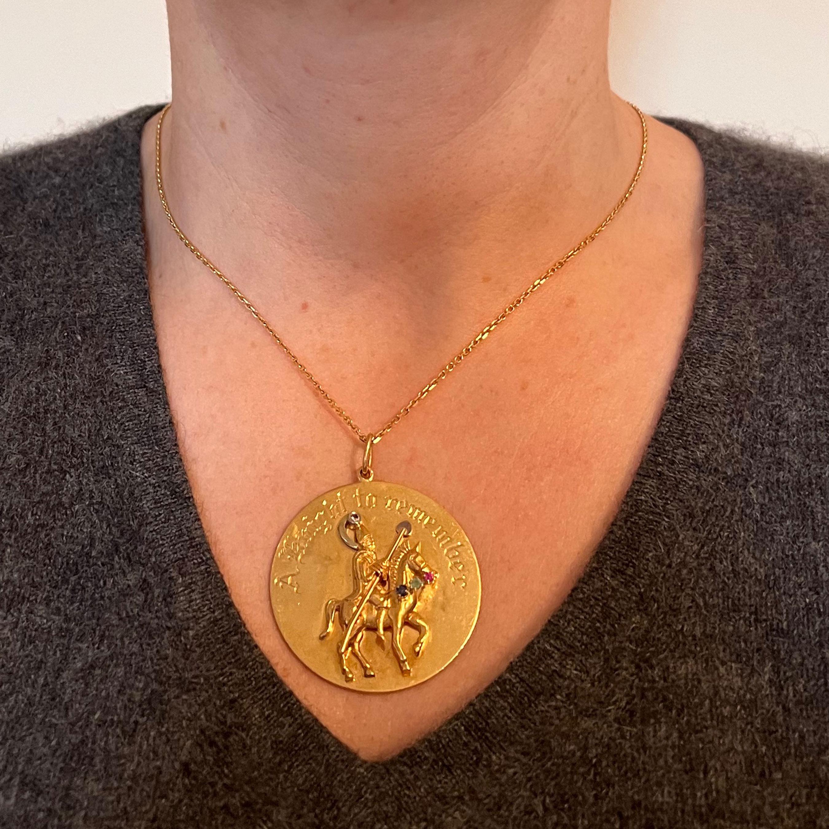 large round gold pendant