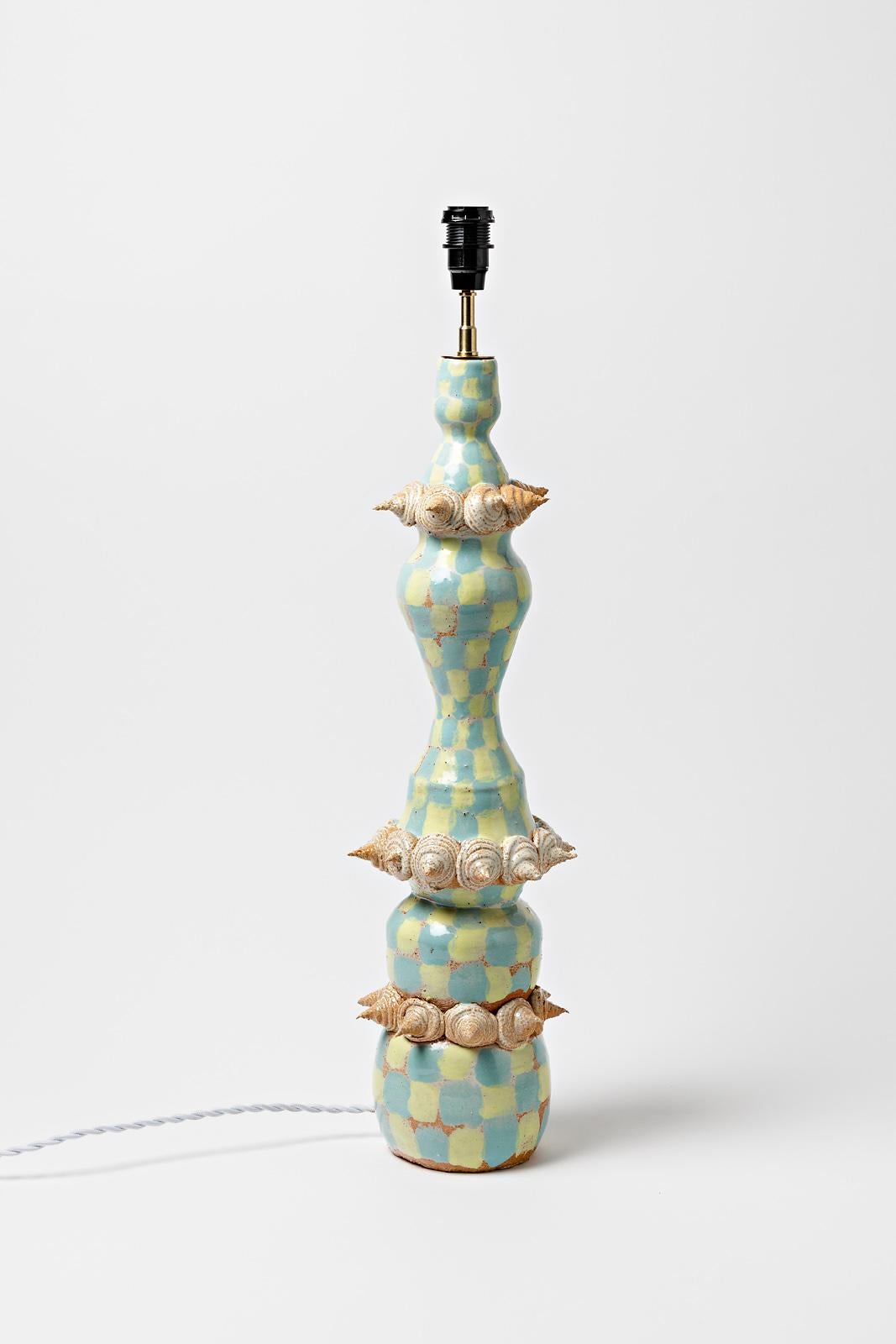 Sauce Mathilde

Elégante grande lampe de table en céramique réalisée en 2021, pièce unique.

Couleurs originales des émaux céramiques bleus, jaunes et orange.

Signé sous la base

Le système électrique est neuf

Mesures de la céramique -