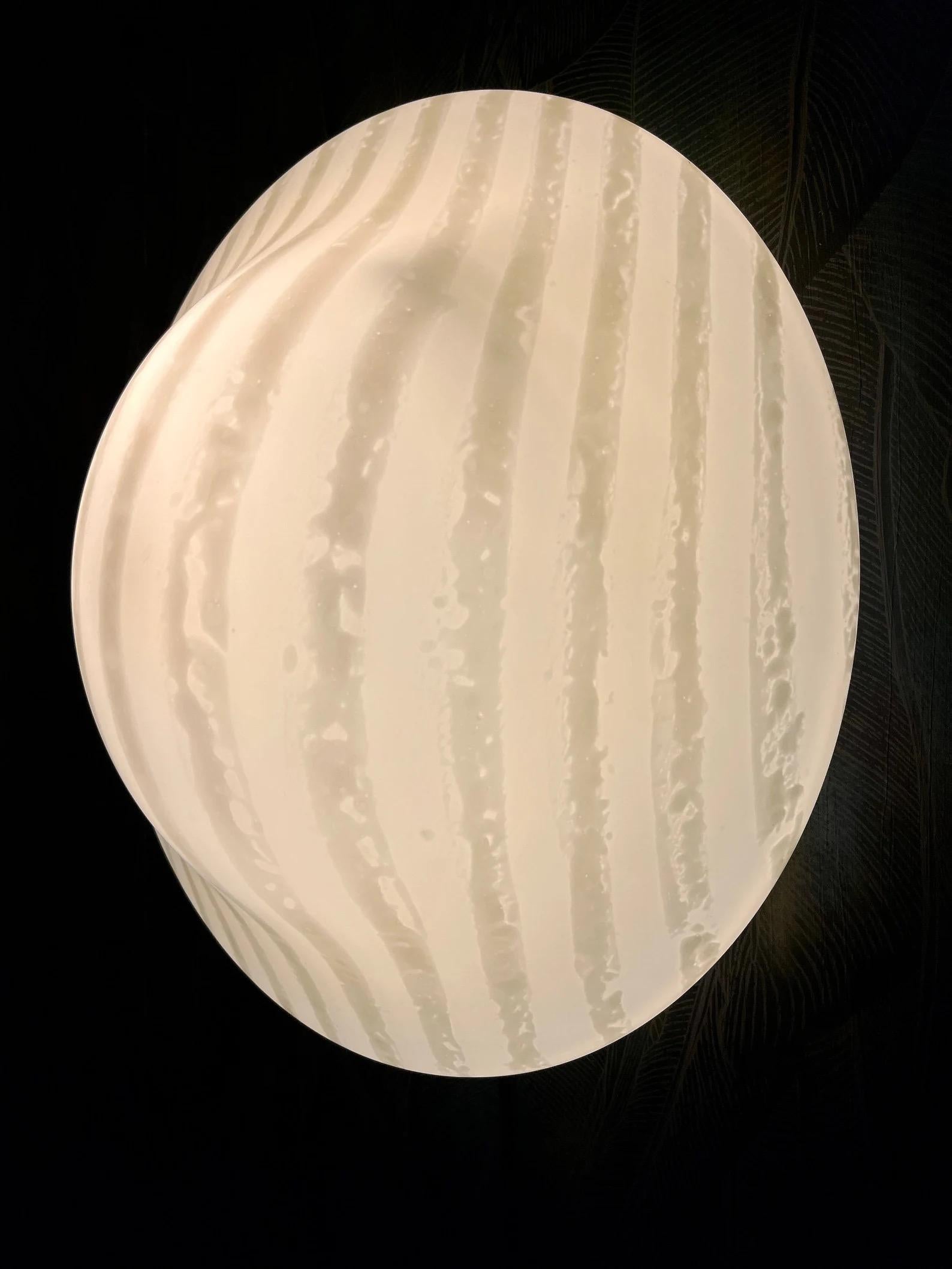 Very beautiful, large, hand-blown Murano wall or ceiling light (made from a single piece) by Peill & Putzler.
Peill & Putzler produced these mushroom lamps in many different shapes and sizes. This is the largest.

Beautiful mid-century design glass