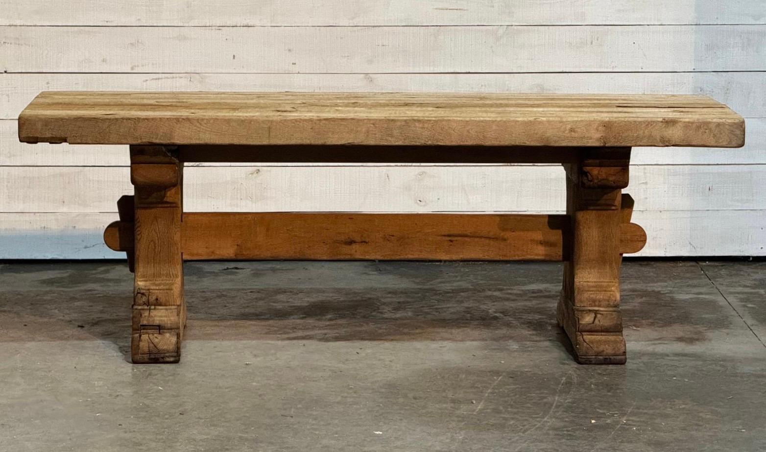 A superb quality French Solid Oak Farmhouse Dining Table dating to the early 1900s, this table has loads of charm and character, we have bleached it for a lighter look and to bring out the natural beauty of the wood. Of excellent quality