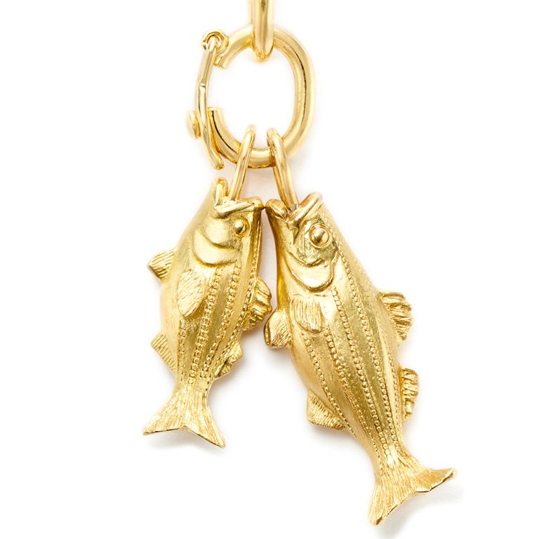 A resident of local waters, in 18 Karat Gold. Suspend your catch from our clasp and a favorite chain. 

Our larger Nantucket Striped Bass Pendant is 11 mm wide x 30.1 mm high
Including the 18 Karat Gold two ring Clasp.

Also available in cufflinks,