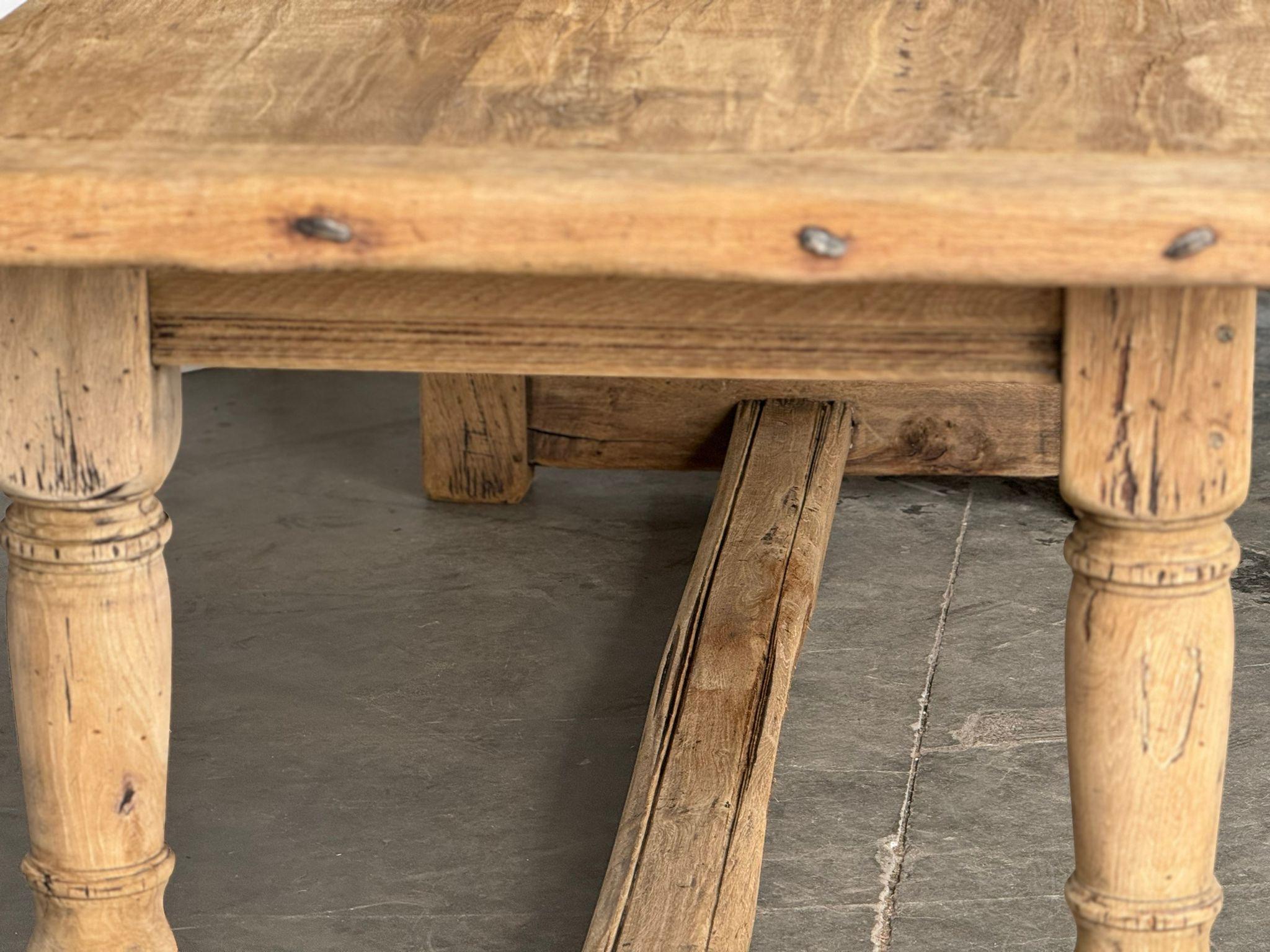 An excellent quality solid Oak Farmhouse Dining Table, this table has the hard to find good depth. Dating to the early 1900s of excellent construction this table will be around for generations to come. 
We have bleached it for a lighter look and to