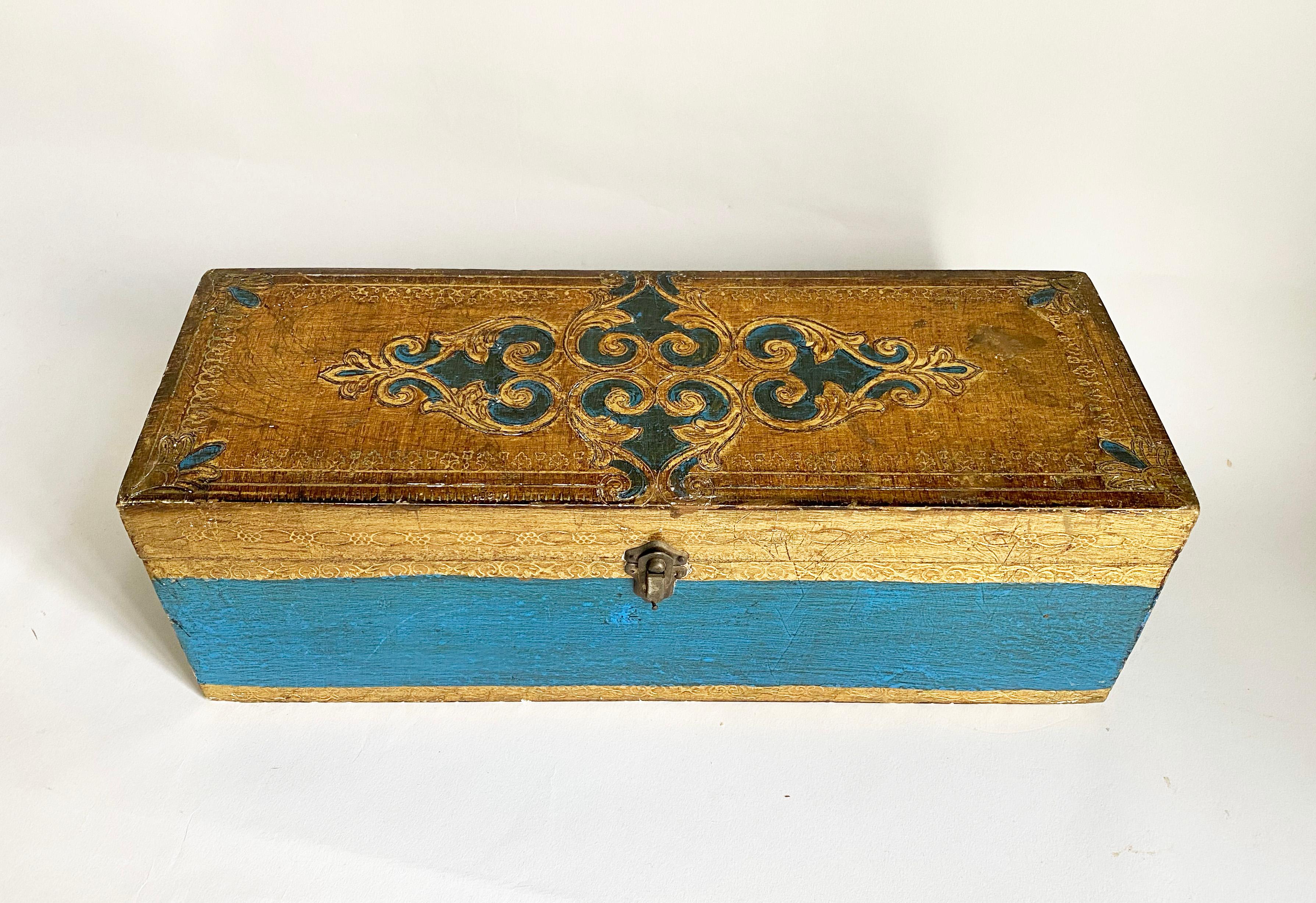 Here is a lovely Florentine hinged box made in Italy. Usually boxes of this style are quite small--made for trinkets--but this is a on the larger side measuring 14.25