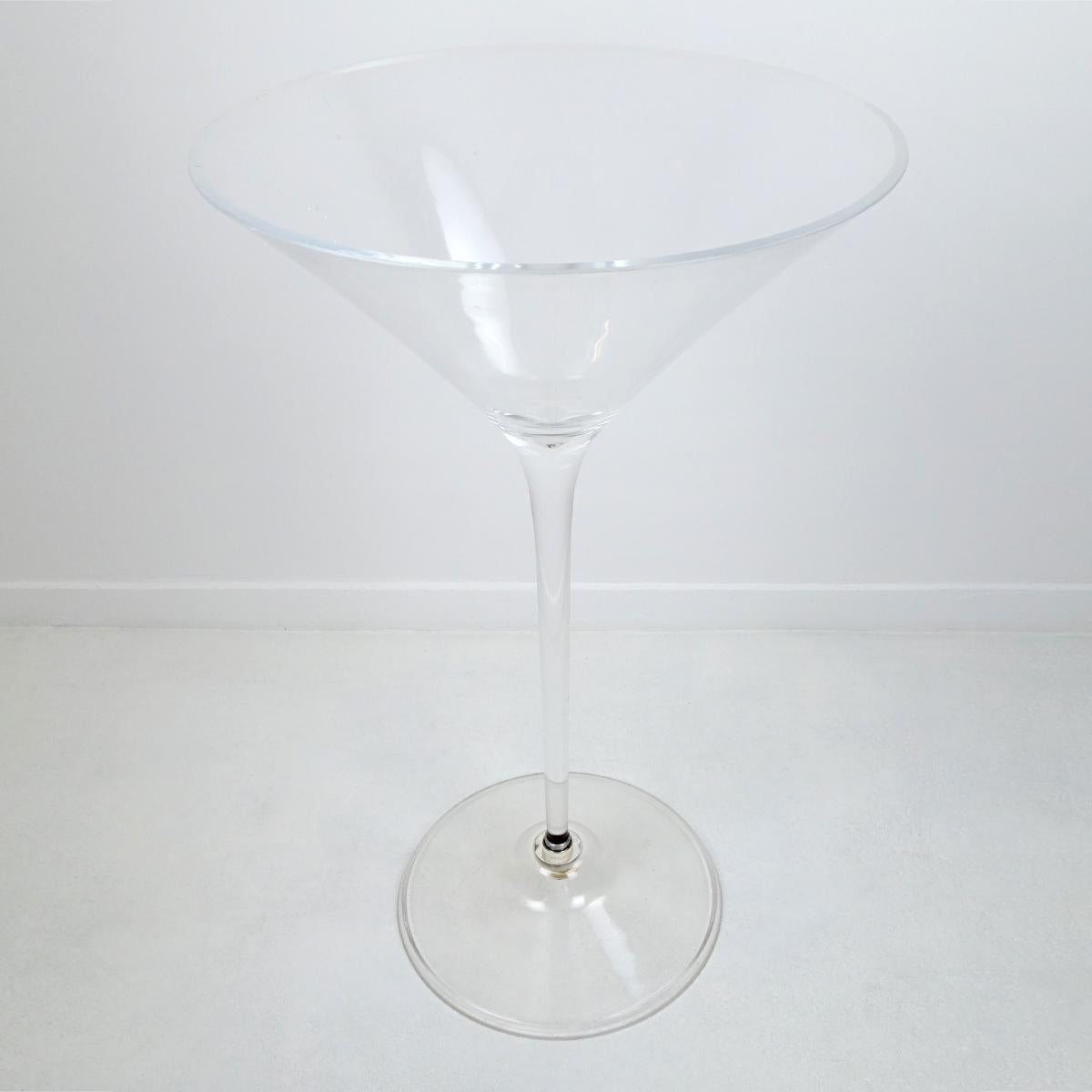 Never thirsty again!
With this enormous cocktail glass (98 cm / 38.59 inch high) in your buffet you will immediately catch all cheerful looks of the guests you are entertaining. 
It may serve as a conversation piece but may also be put to good use