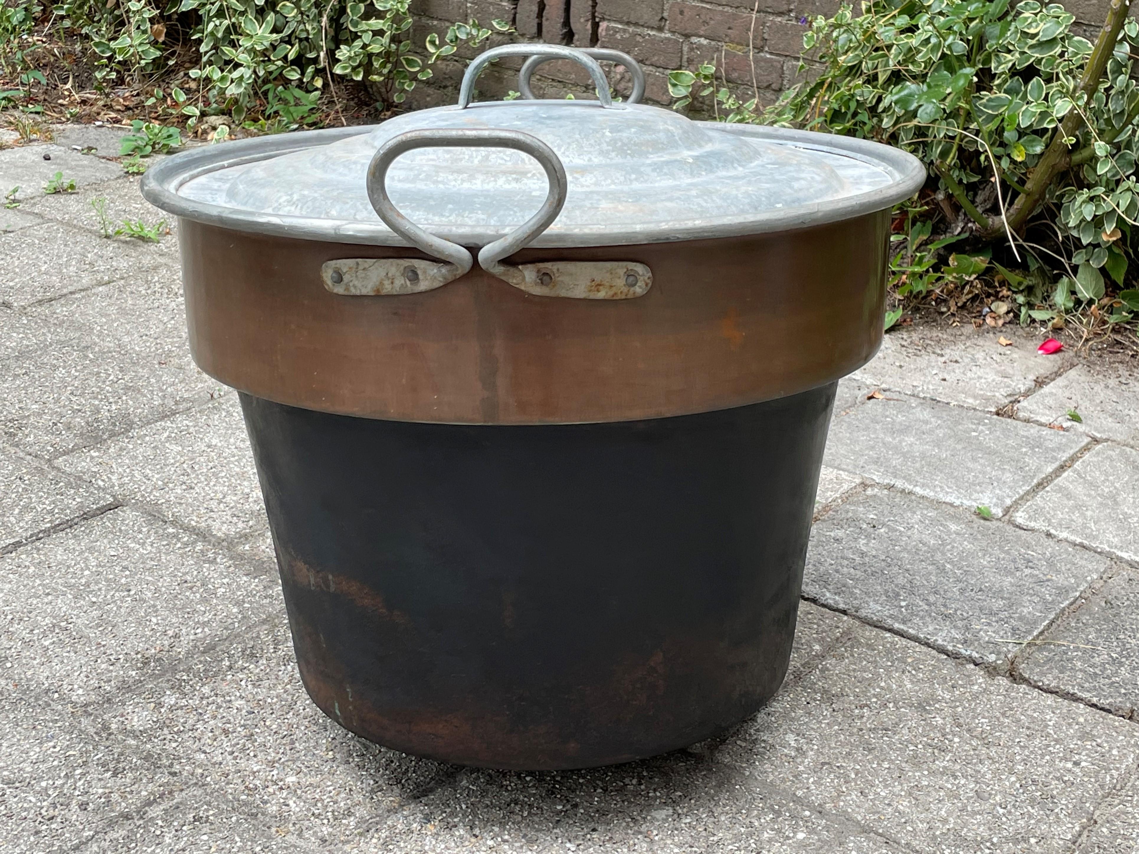Marvelous size and timeless shape, partially galvanized copper bucket for inside and outside usage.

Only the wealthiest of people in the late 1800s would have been able to afford a hand-crafted copper bucket of this size and quality. This extra