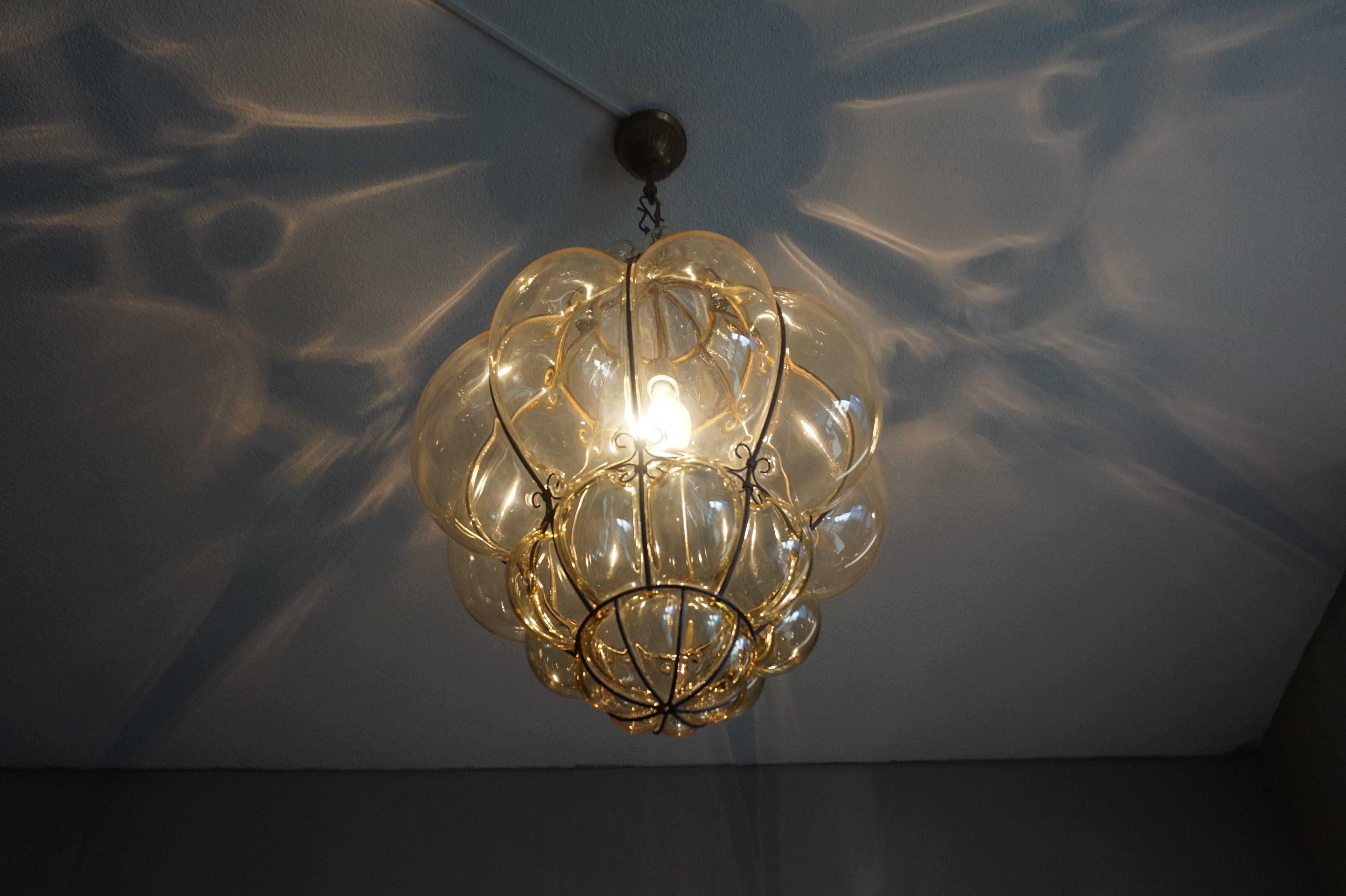 Extra large and superb condition, vintage Murano mouth blown chandelier.

To give you a better idea of the extra large and wonderful size of this striking Murano fixture we have added image 6 where it is next to one of our regular size and next to