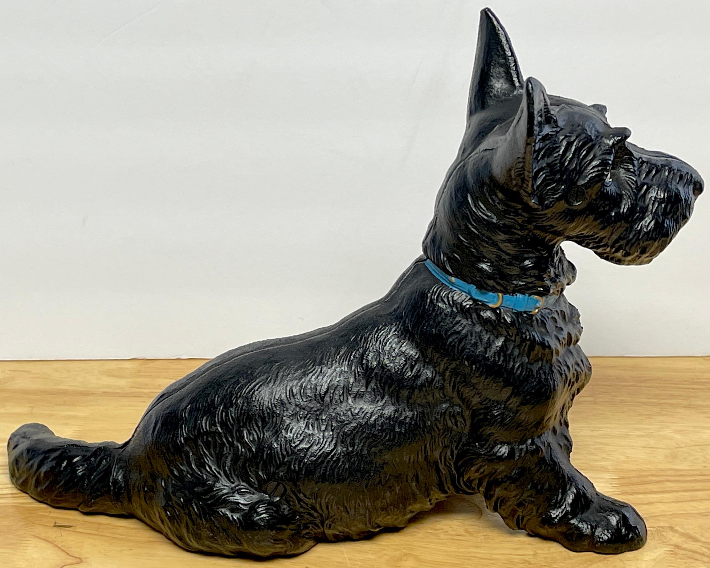 Largest Hubley Seated Scotty with Collar Doorstop, A pristine example of the largest model of the seated Scotty dog doorstop Hubley made. Complete with blue collar, this model is a beauty from every angle. Original paint. 
 
