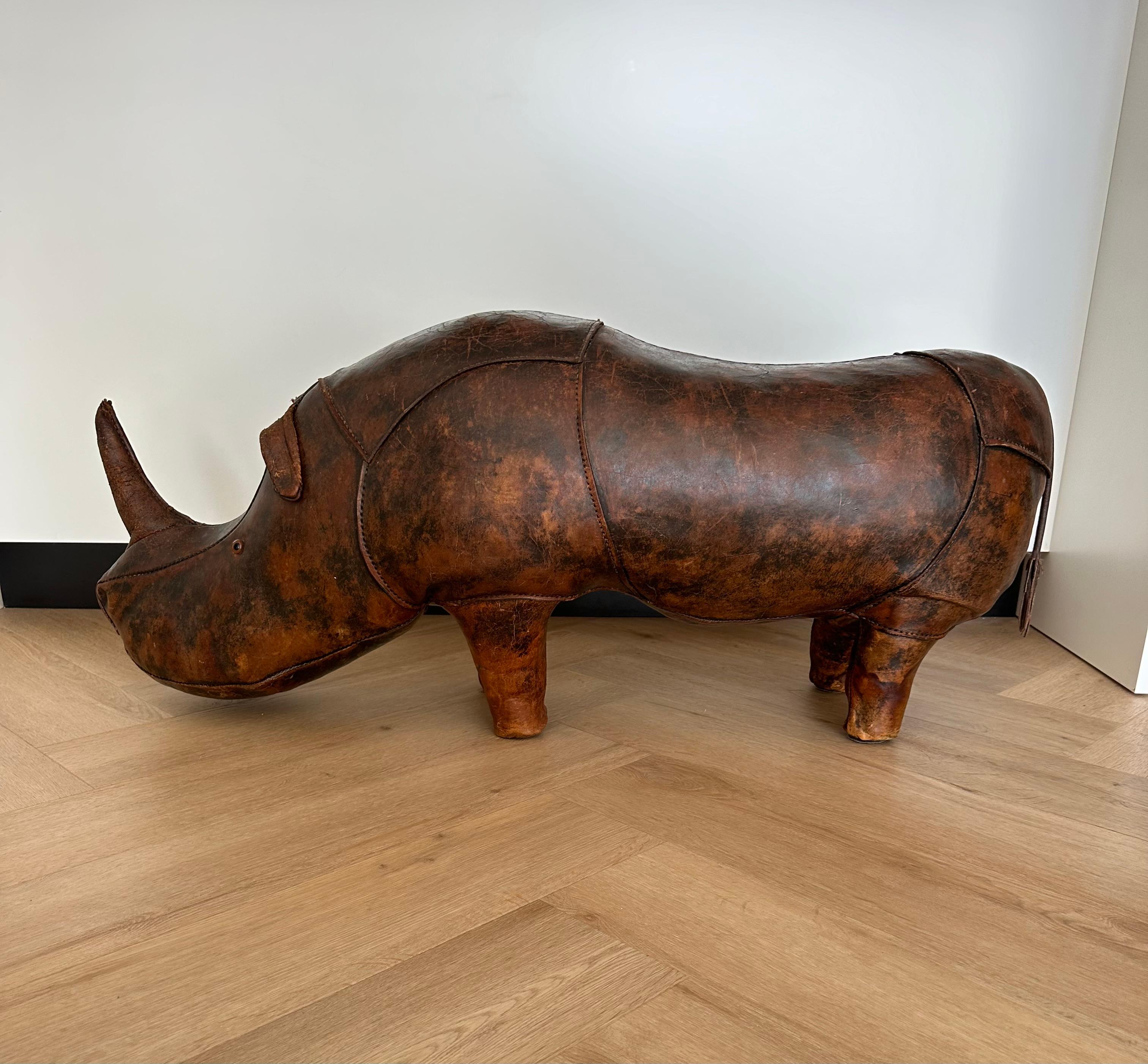 A wonderful and original collectors example of the large-size rhinoceros footstool by Dimitri Omersa for Abercrombie and Fitch.

This impressive size and highly decorative design Rhino footstool has great aesthetic value. This is the largest