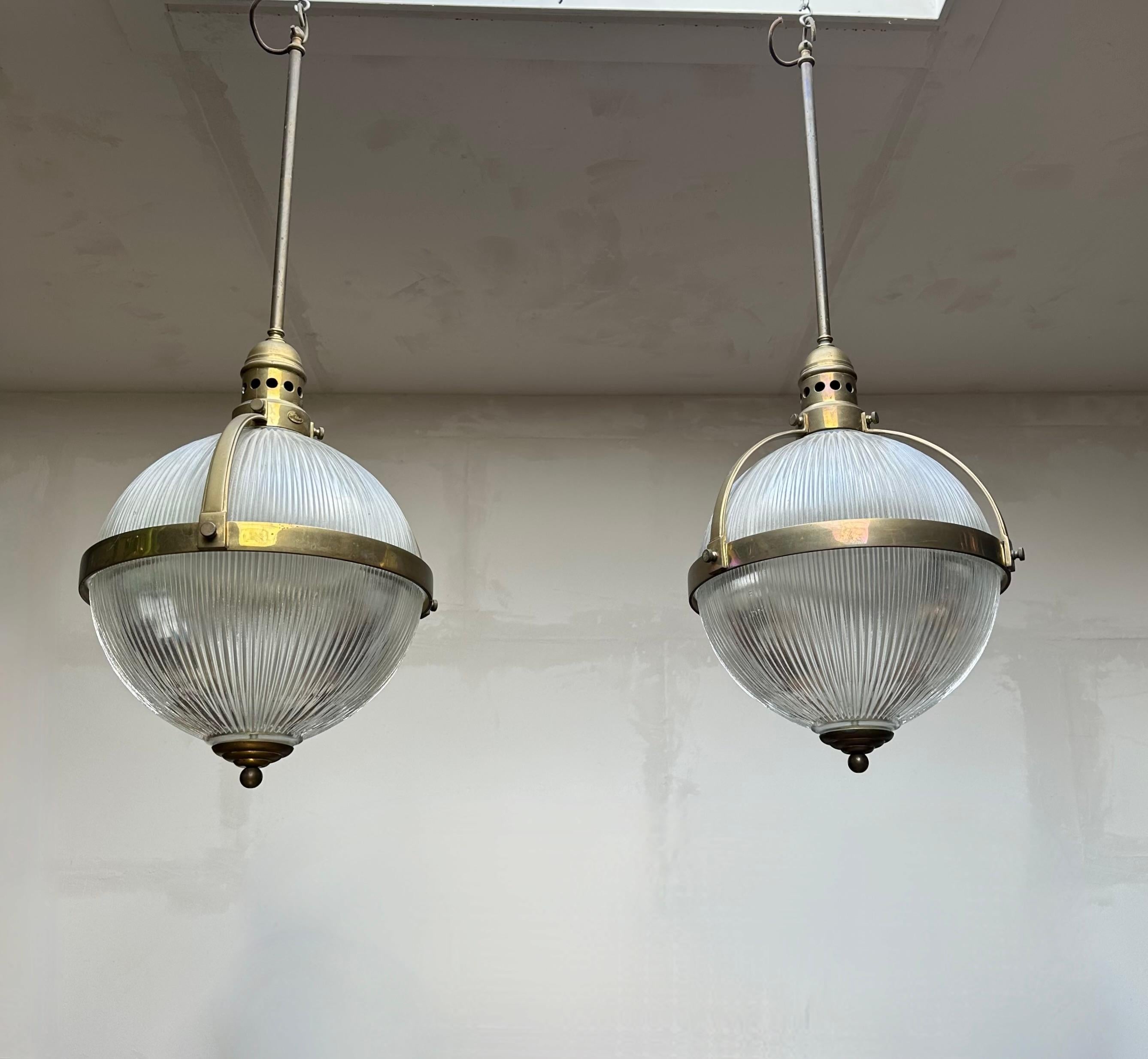 Extra large size and great shape pair of identical pendants / light fixtures.

If you are looking for a pair of beautiful and truly stylish pendants for a Midcentury, for an Art Deco or even for a contemporary interior then this pair could be your