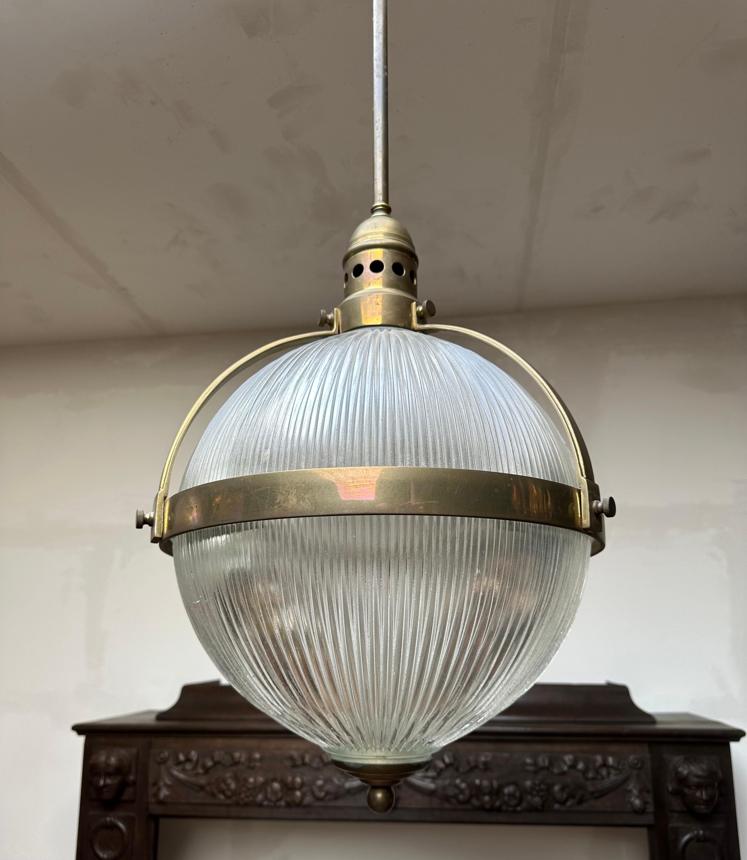 Cast Largest Pair of Art Deco Style Bronze and Glass Holophane Style Pendant Lights For Sale