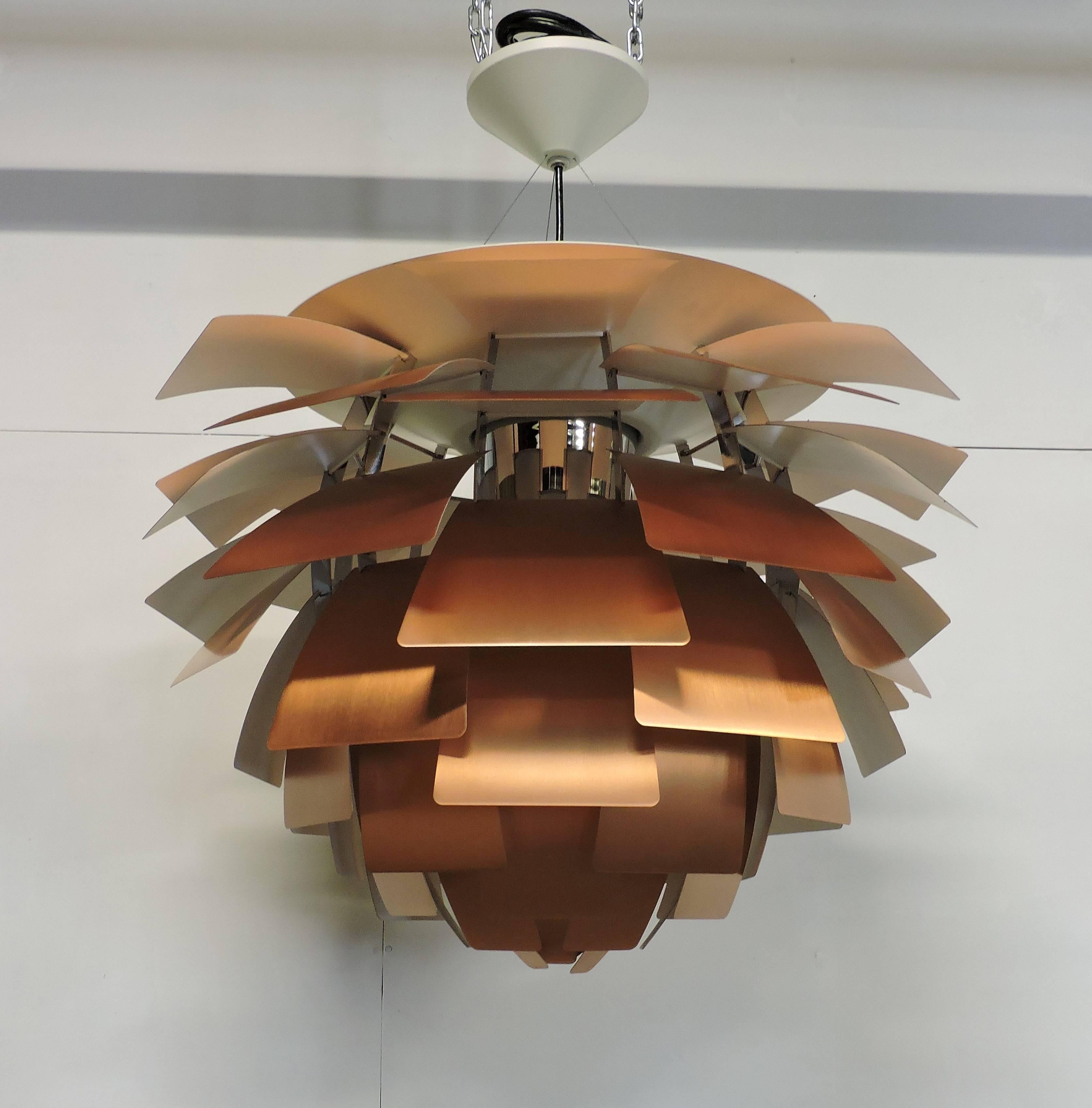 Beautiful PH Artichoke pendant light designed by Poul Henningsen and made in Denmark by Louis Poulsen. This light has copper shades, and at 33 inches diameter, is the largest size manufactured. It is fully labelled and can have a much longer drop