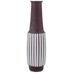 Larholm, Norway. Ceramic floor vase. Modernist design with vertical lines.