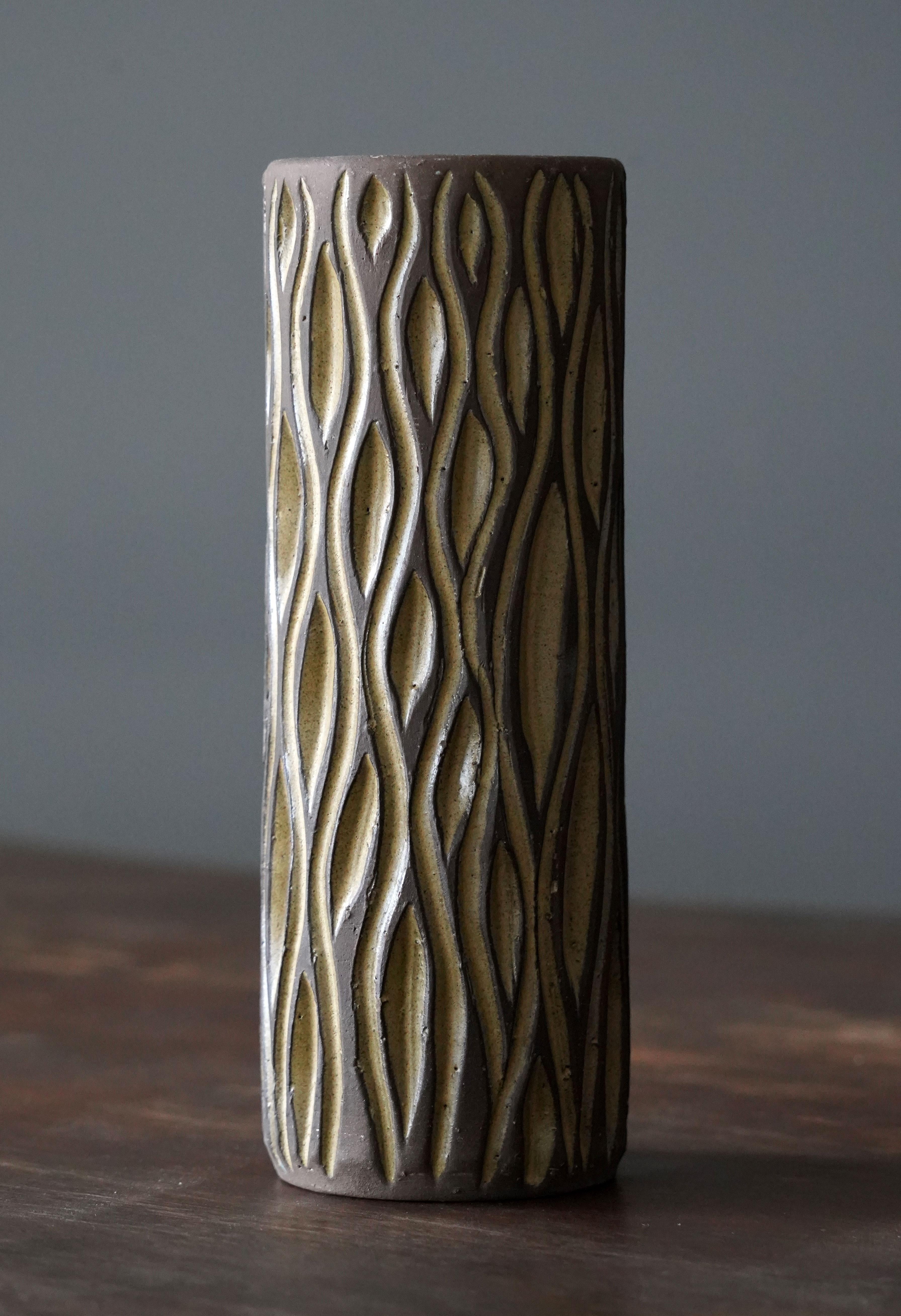 A decorative vase / vessel. Produced by Larholm, Norway, circa 1950s.

Other designers of the period include Axel Salto, Arne Bang, Carl-Harry Stålhane, and Gunnar Nylund.