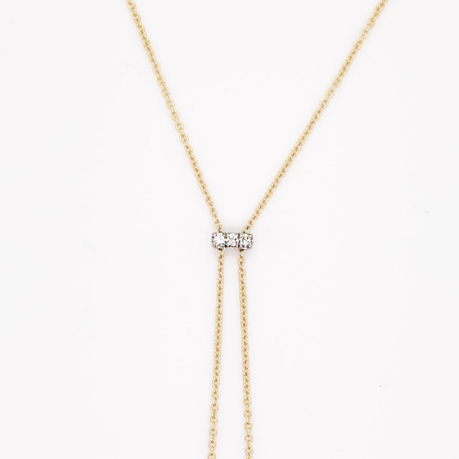 This striking makes quite an iconic statement with diamonds in the center and on the ends of the bars.  It hangs beautifully on anyone’s neck and is great with a v shape or rounded neckline. We had one client buy this necklace for their wedding