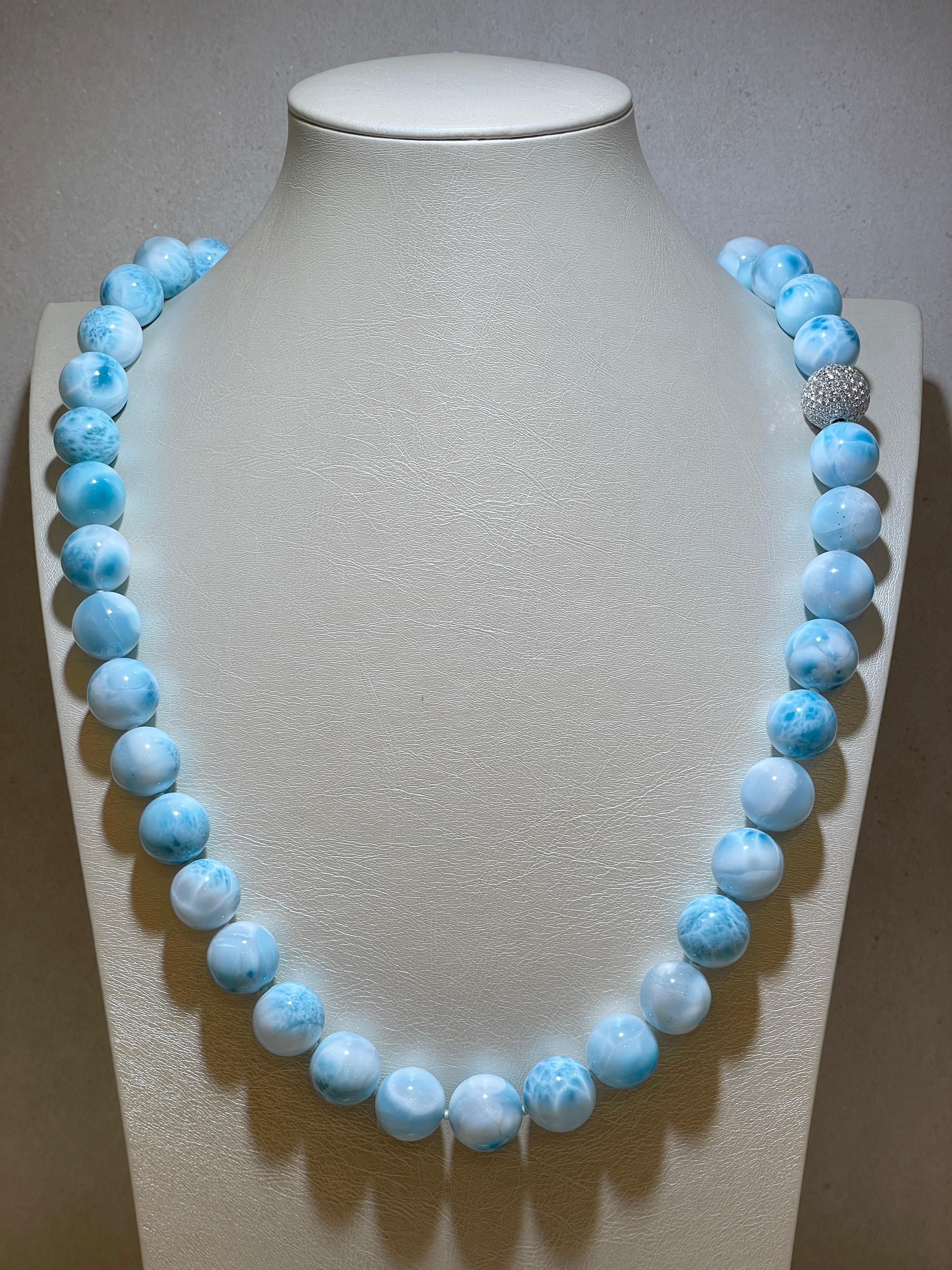 This Larimar necklace, comprised of 45 beads measuring 16mm each, is adorned with a diamond clasp. The 16mm diamond clasp, featuring a total of 188 brilliant-cut diamonds weighing 5.44ct, can be replaced with a more affordable 18kt white gold clasp