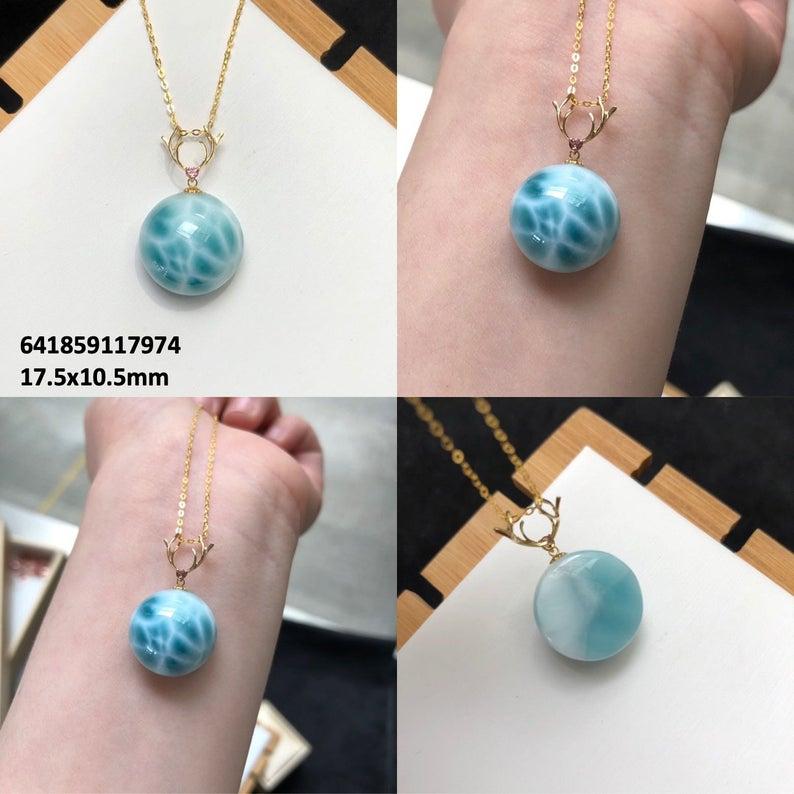 
Larimar Necklace 18 Karat Yellow Gold These Larimar necklaces  can be custom made too so if you also looking for anything specific  let us know and are have other shapes in these too. This one has a heart shape in the gold at top of pendant.