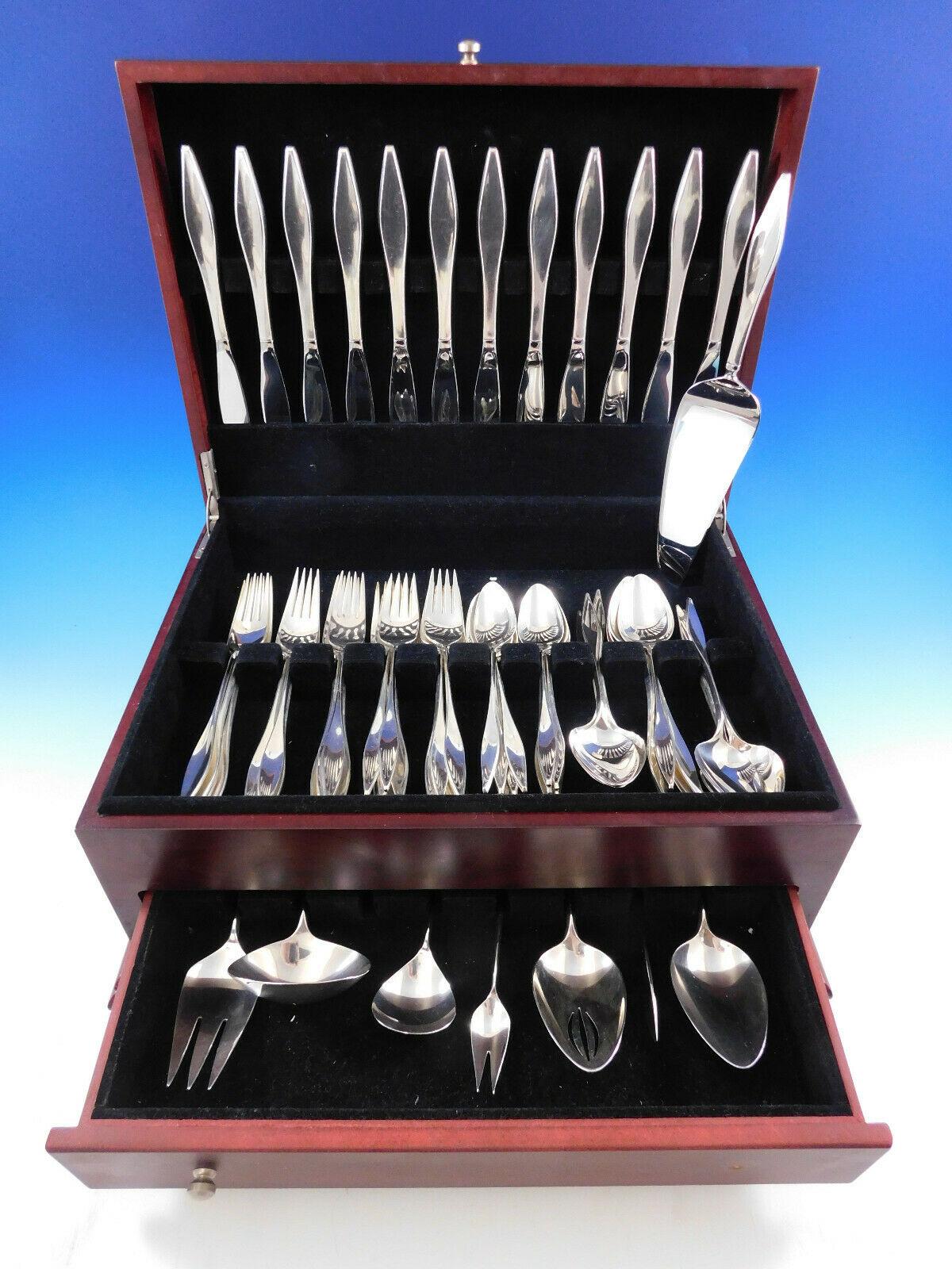 Mid-Century Modern Lark By Reed & Barton sterling silver Flatware set - 48 Pieces. Designed by John Prip. John Prip (1922-2009) was a master metalsmith known for setting standards of excellence in American metalsmithing. His works and designs have