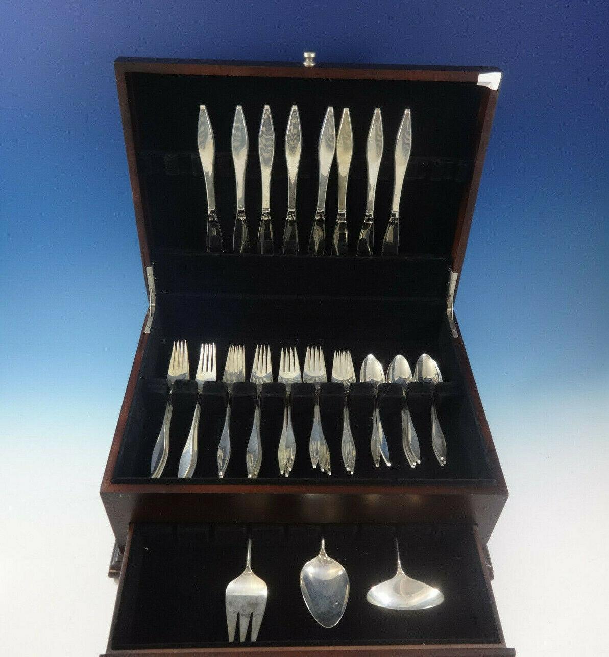 Mid-Century Modern Lark by Reed & Barton sterling silver flatware set - 35 pieces. Designed by John Prip. This set includes:

8 knives, 9