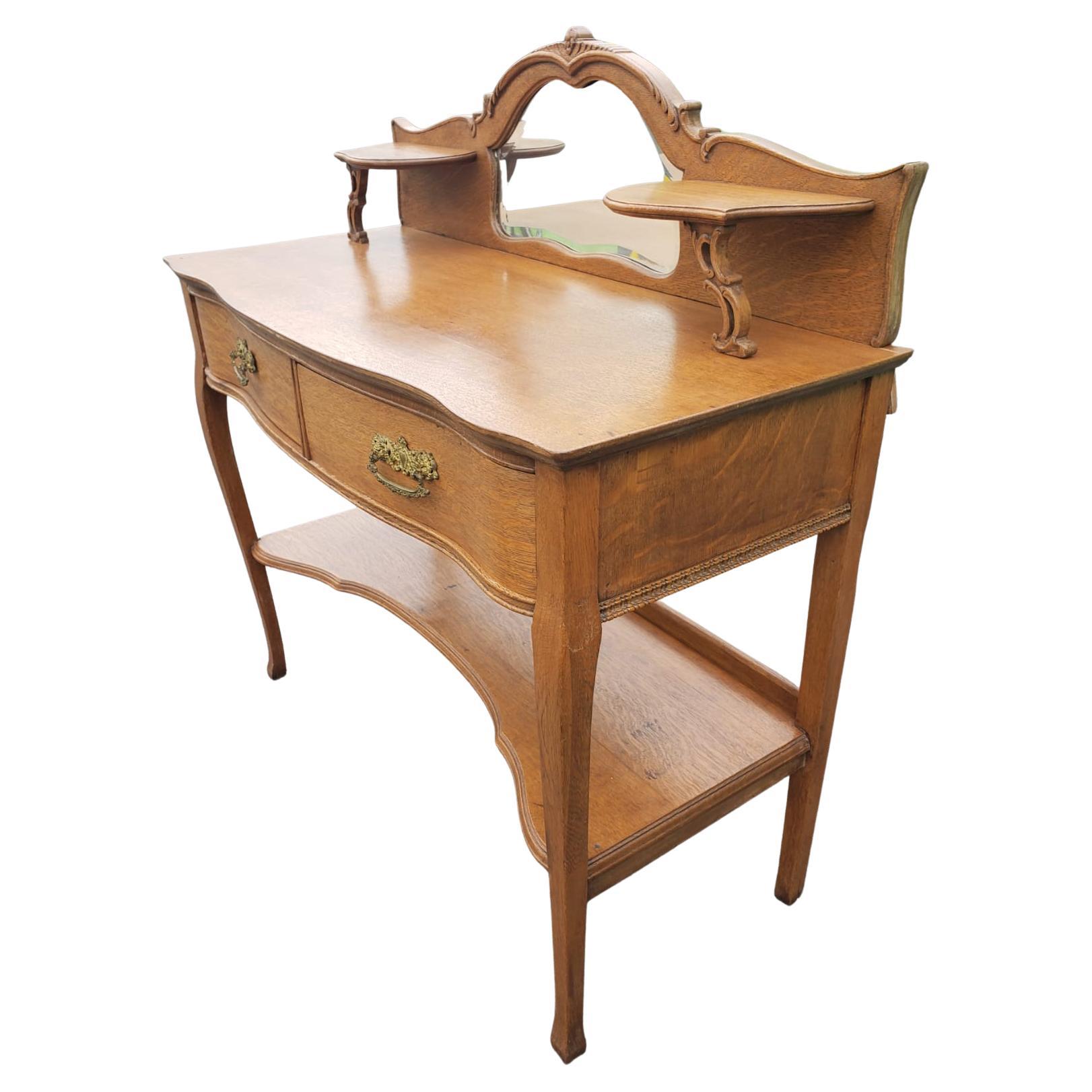 Larkin and Co. antique tier quater sawn oak vanity / dresser with integrated mirror Circa 1930s
Measures 42