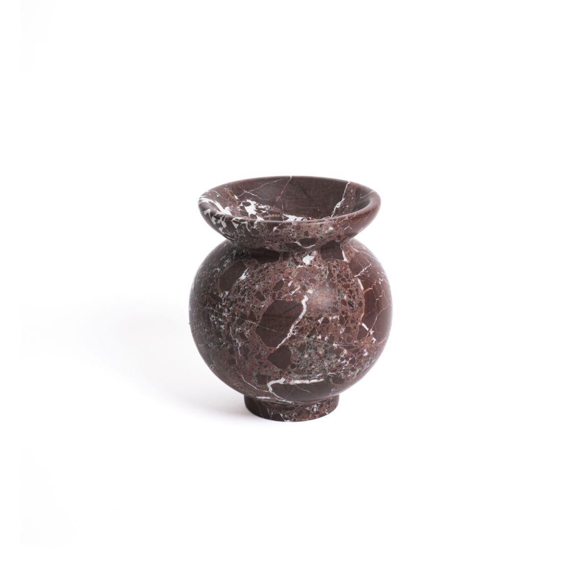 Introducing the Larp Orb Vase, a one of a kind marble vase designed for long-lasting pleasure. Each piece is unique, crafted from natural marble and finished with meticulous detail. This vase will bring a touch of elegance and sophistication to any