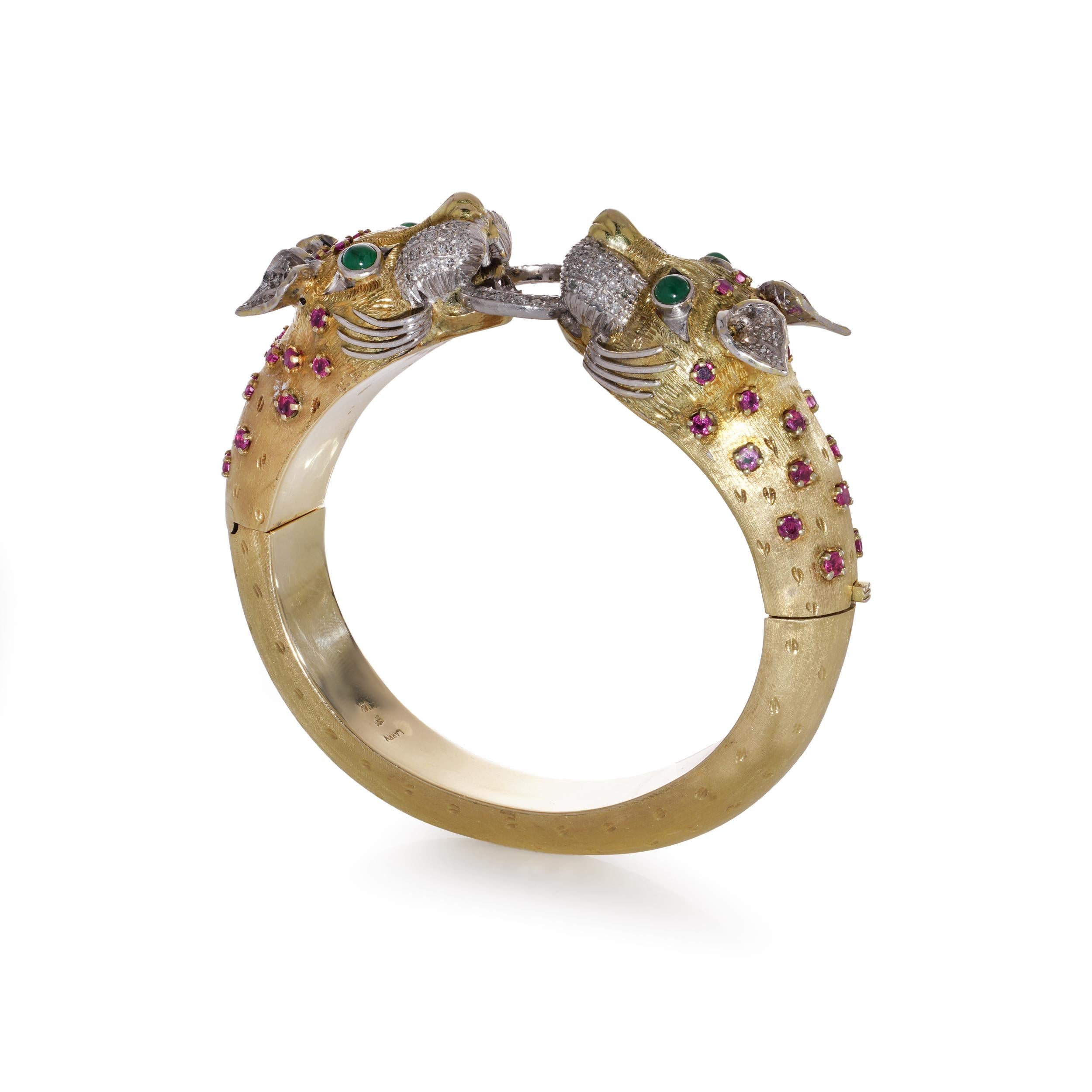 Round Cut Larry 14kt. gold bangle with two dragon heads with diamonds, emeralds and rubies For Sale