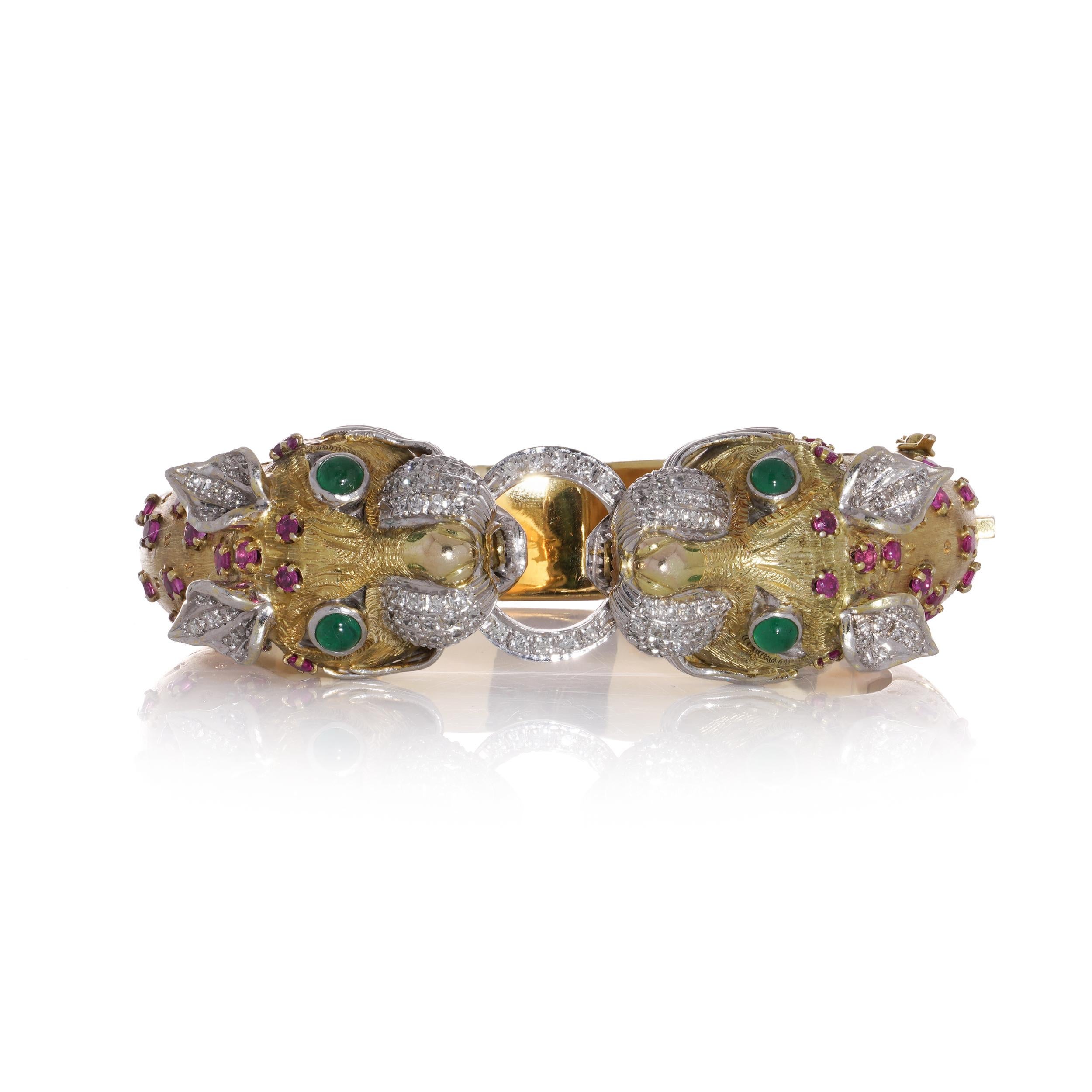 Women's Larry 14kt. gold bangle with two dragon heads with diamonds, emeralds and rubies For Sale