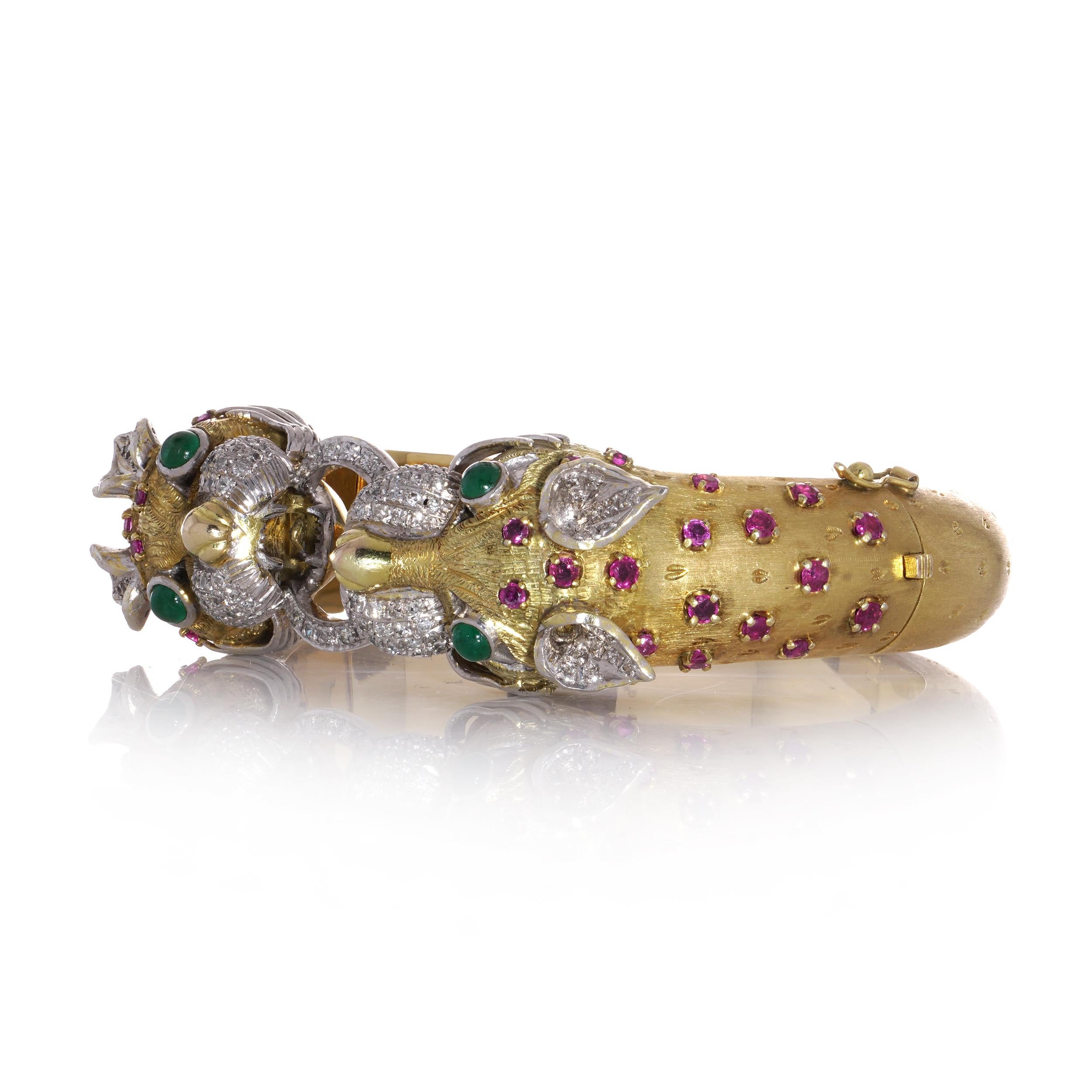 Larry 14kt. gold bangle with two dragon heads with diamonds, emeralds and rubies For Sale 1